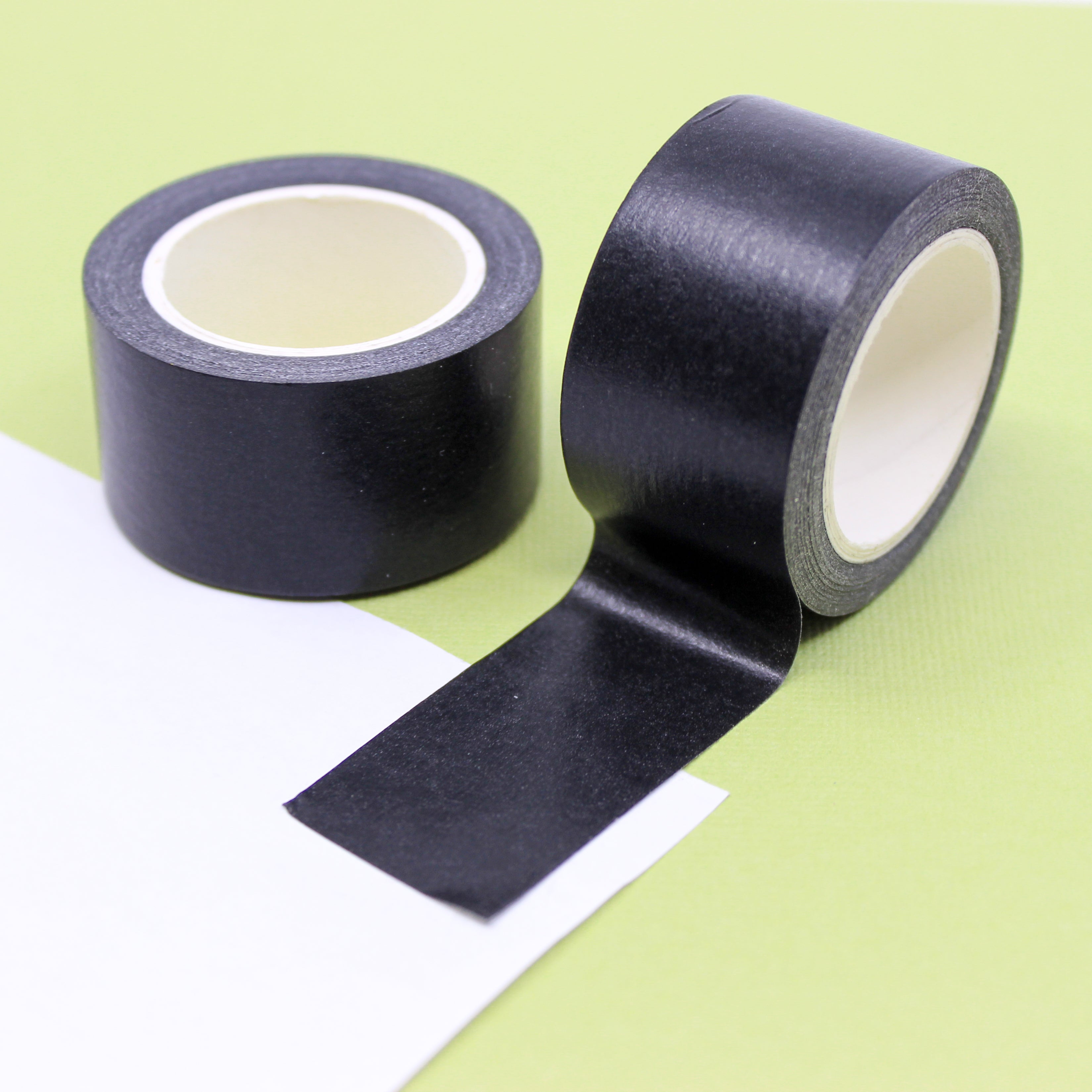 Enhance your crafts with our solid black washi tape, featuring a sleek and versatile design in a classic black hue, perfect for adding depth and contrast to your projects. This tape is sold exclusively at BBB Supplies Craft Shop.
