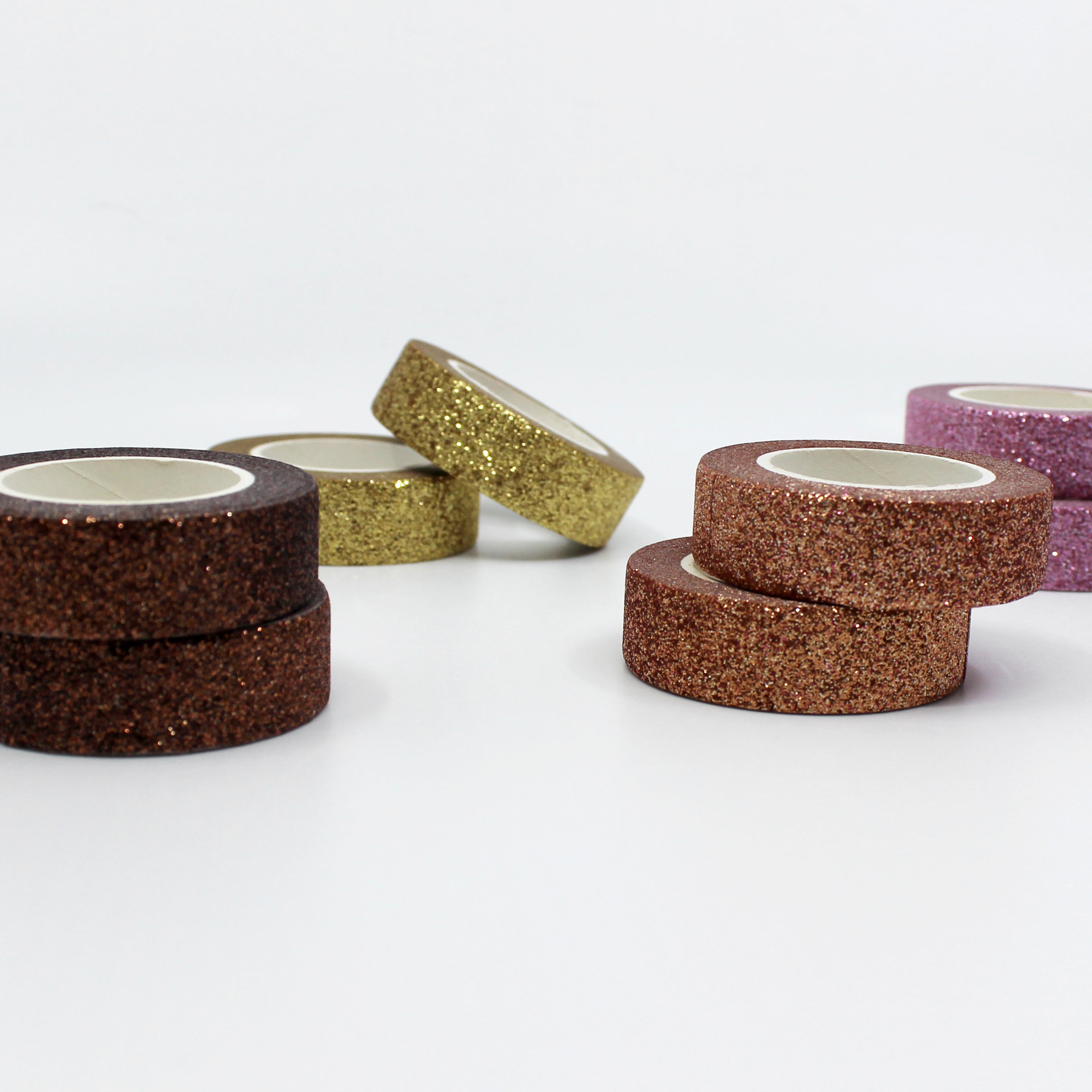 Embrace the warmth of autumn with our glittering washi tape in autumn colors, featuring a blend of rich hues and sparkling glitter, perfect for adding a touch of seasonal magic to your crafts. These Glitter Tapes are sold at BBB Supplies Craft Shop.