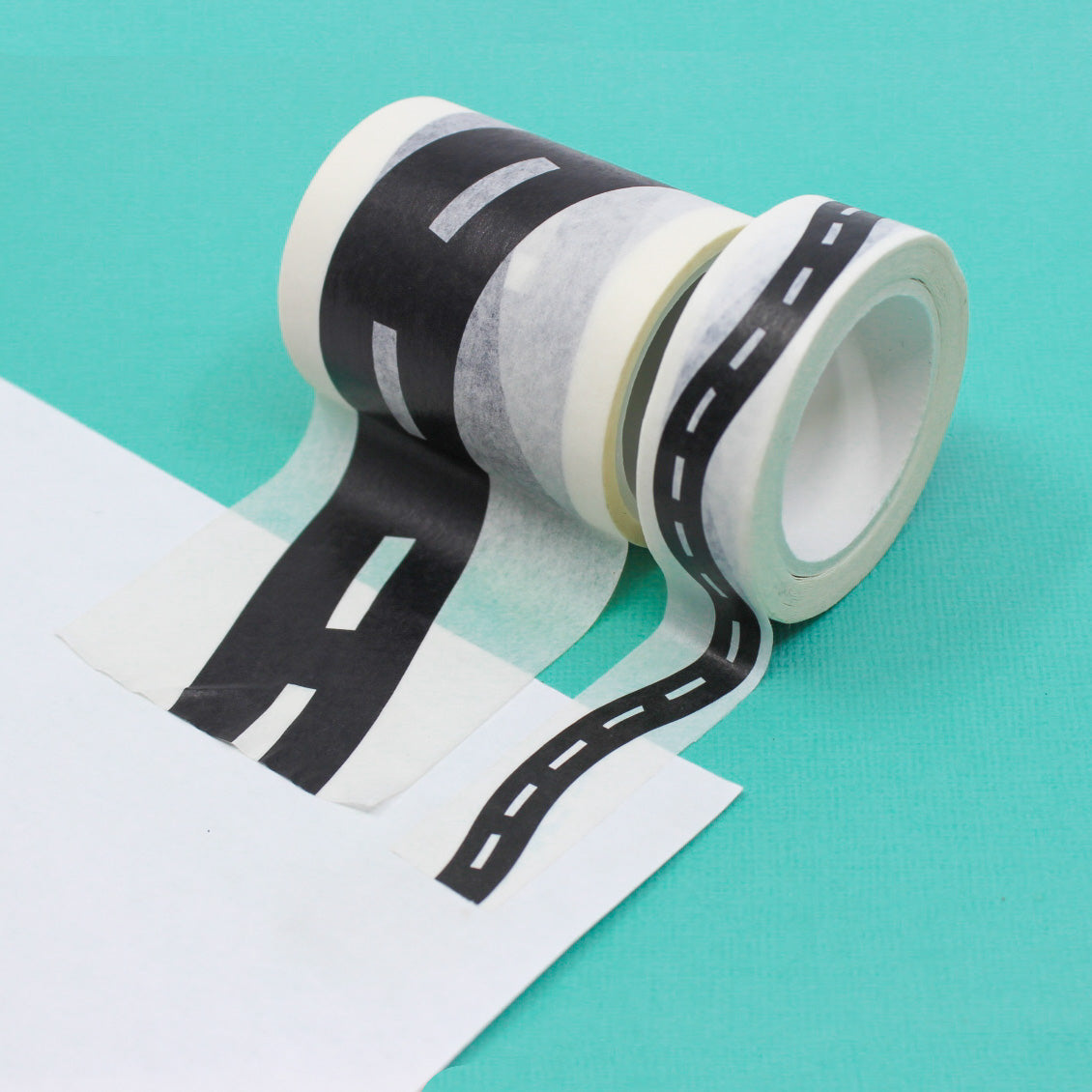 Elevate kids' playtime with our captivating road-themed washi tape, showcasing a road pattern that transforms any surface into a miniature roadway, sparking creative play and exploration. This Tape is sold at BBB Supplies Craft Shop.