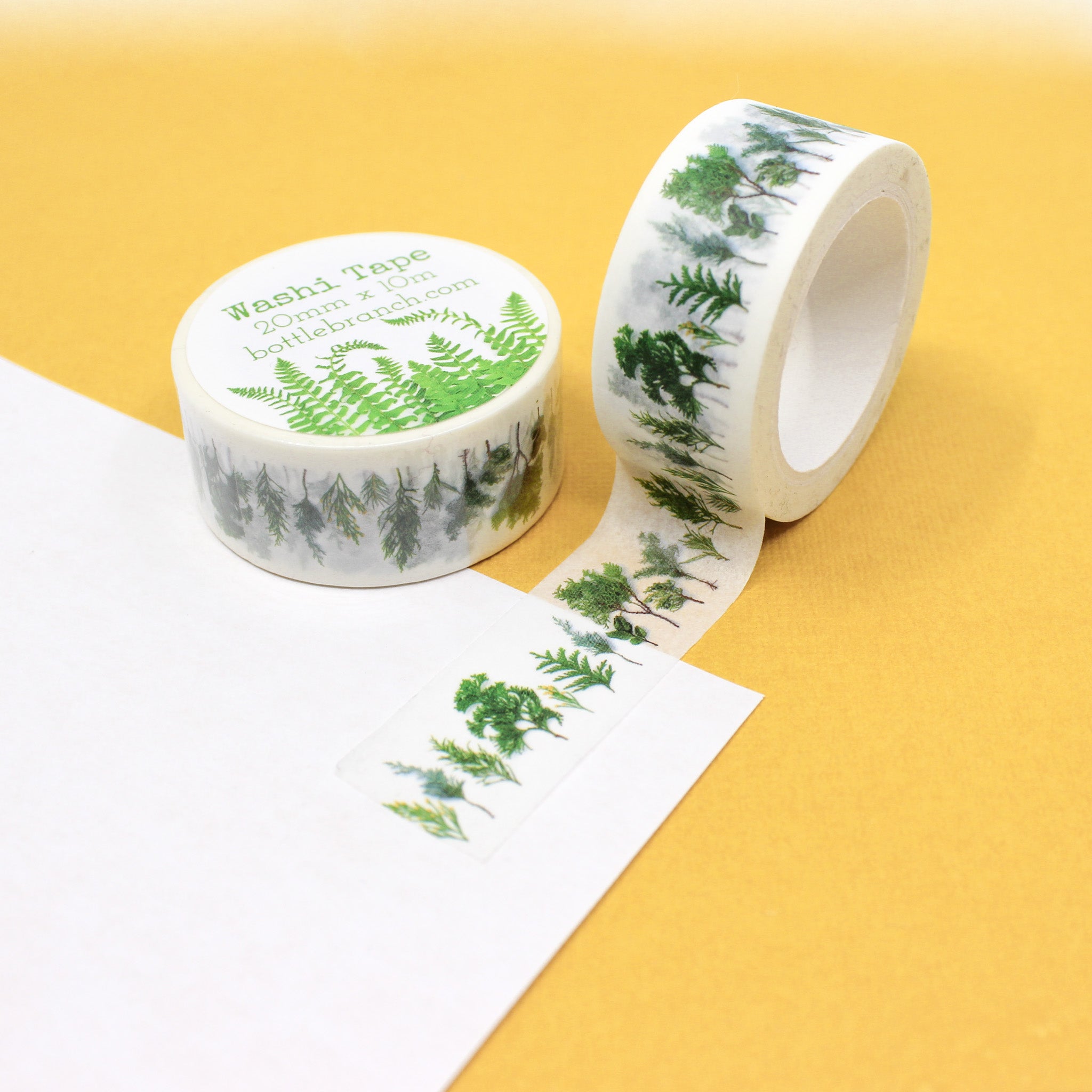 Embrace the beauty of nature with our evergreen greenery sprig washi tape, featuring a lush and vibrant sprig of evergreen foliage. Infuse your crafts with the timeless charm of nature using our evergreen greenery sprig washi tape. This tape is designed by Bottle Branch and sold at BBB Supplies Craft Shop.