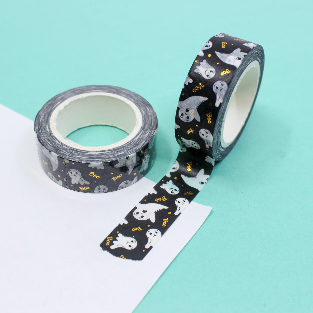 Celebrate Halloween with our Friendly Ghost Gold Foil 'Boo' Halloween Washi Tape, featuring adorable ghost and 'Boo' designs in shimmering gold foil. Ideal for adding a festive and spooky touch to your projects. This tape is sold at BBB Supplies Craft Shop.