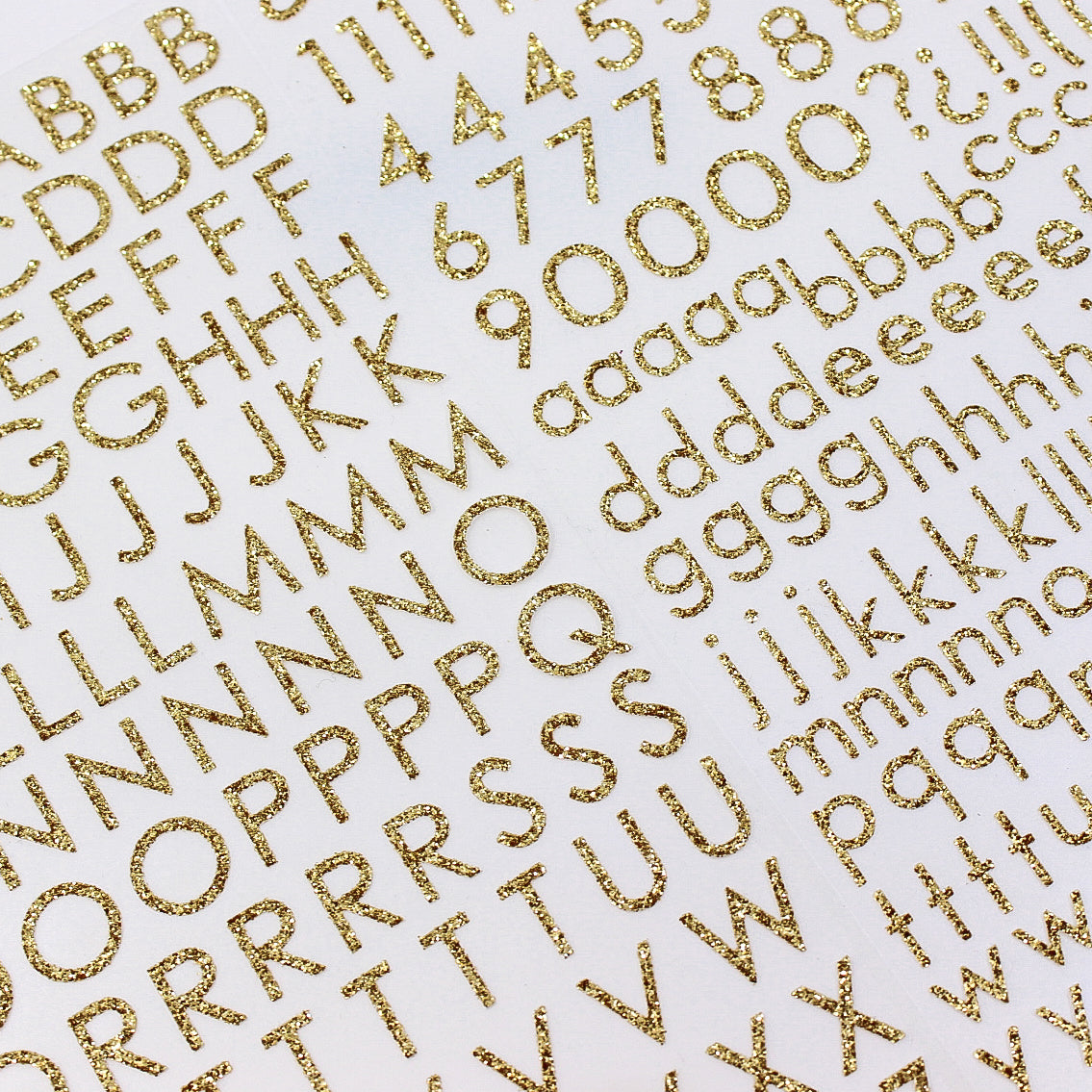 Gold glitter block store letters