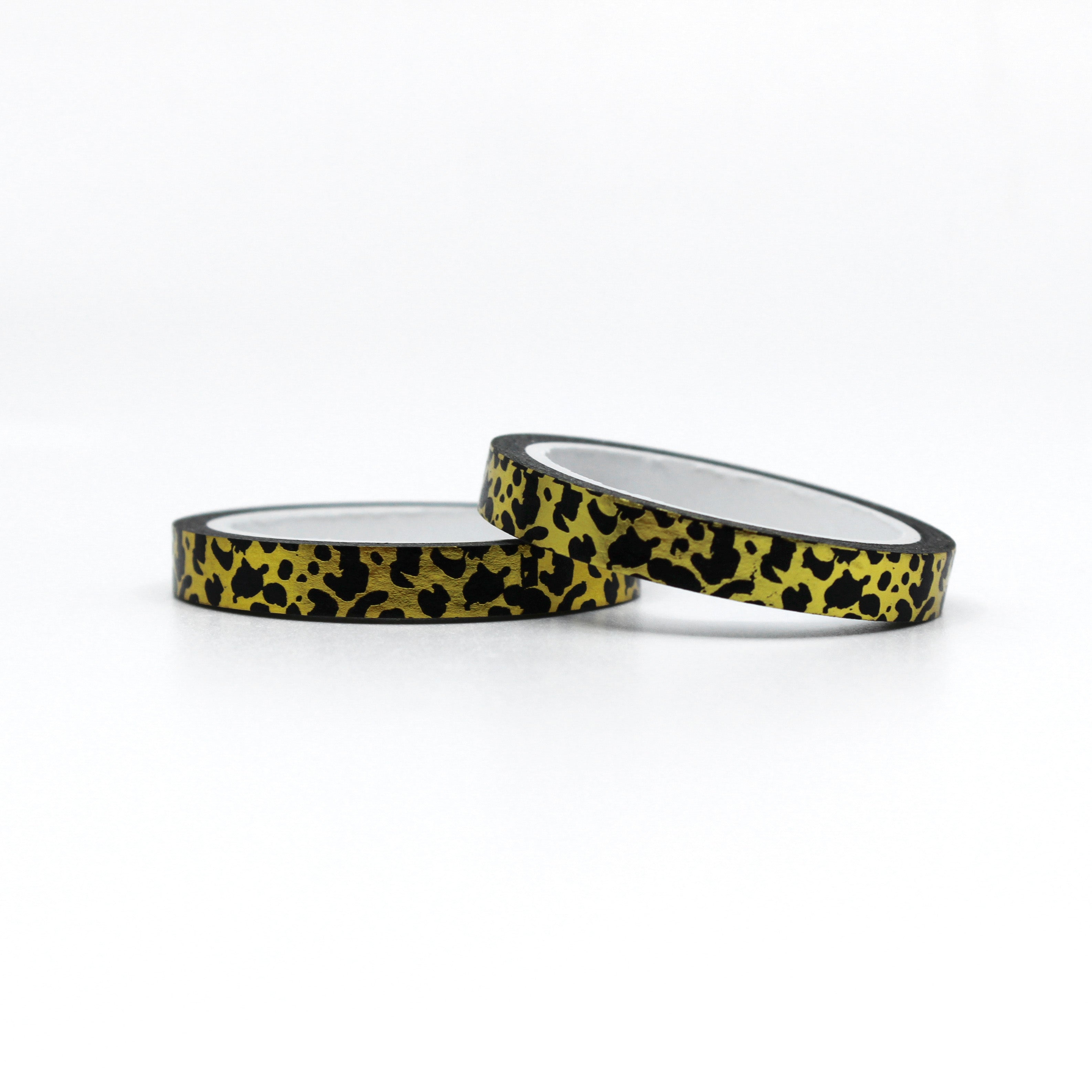 Elevate your crafts with our gold foil narrow leopard print washi tape, featuring a sleek and luxurious leopard print design accented with shimmering gold foil, perfect for adding a touch of wild elegance to your projects. This tape is sold at BBB Supplies Craft Shop.
