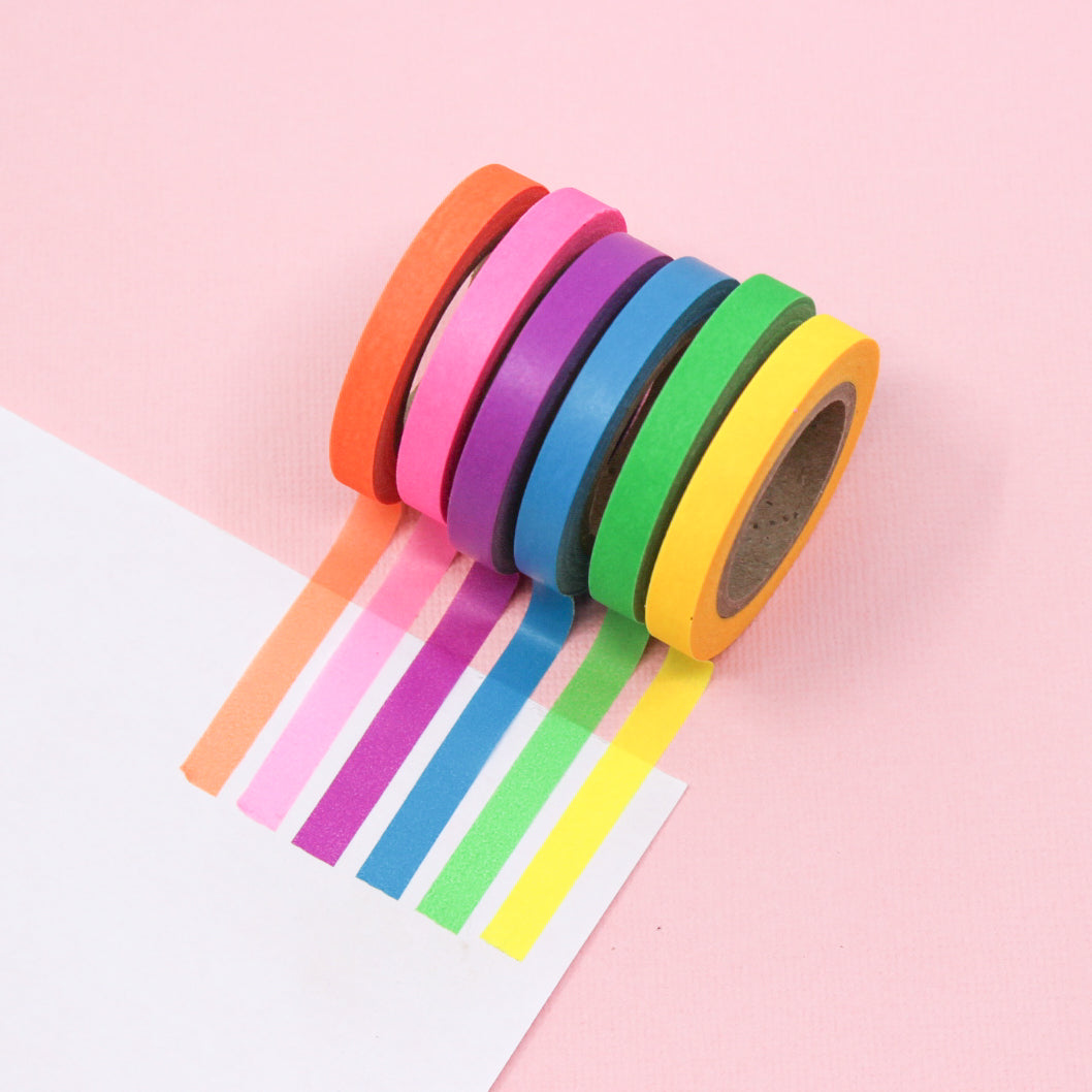 Brighten up your crafts with our Neon Color Narrow Solid Washi Tape Set. This set includes a selection of narrow washi tapes in vivid neon colors, perfect for adding a bold and electrifying touch to your projects. This tape is sold at BBB Supplies Craft Shop.