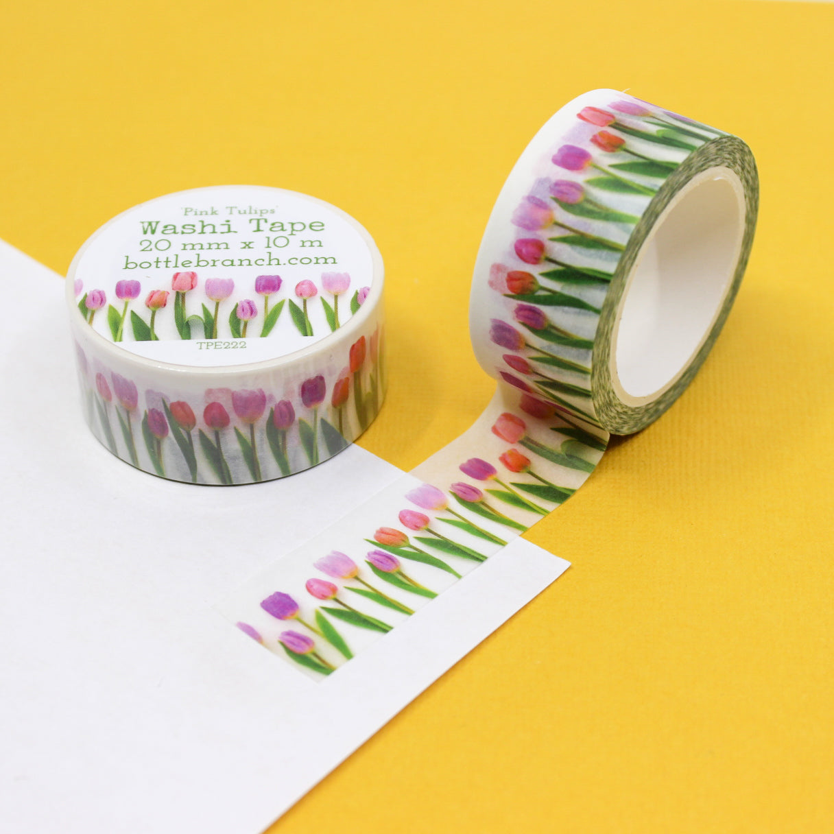 Add a touch of floral elegance with our charming pink tulip washi tape, featuring graceful tulip flowers in varying shades of pink. Capture the essence of blooming gardens with our pink tulip washi tape, showcasing vibrant tulip blossoms in delightful shades of pink. This tape is designed by Bottle Branch and sold at BBB Supplies Craft Shop.