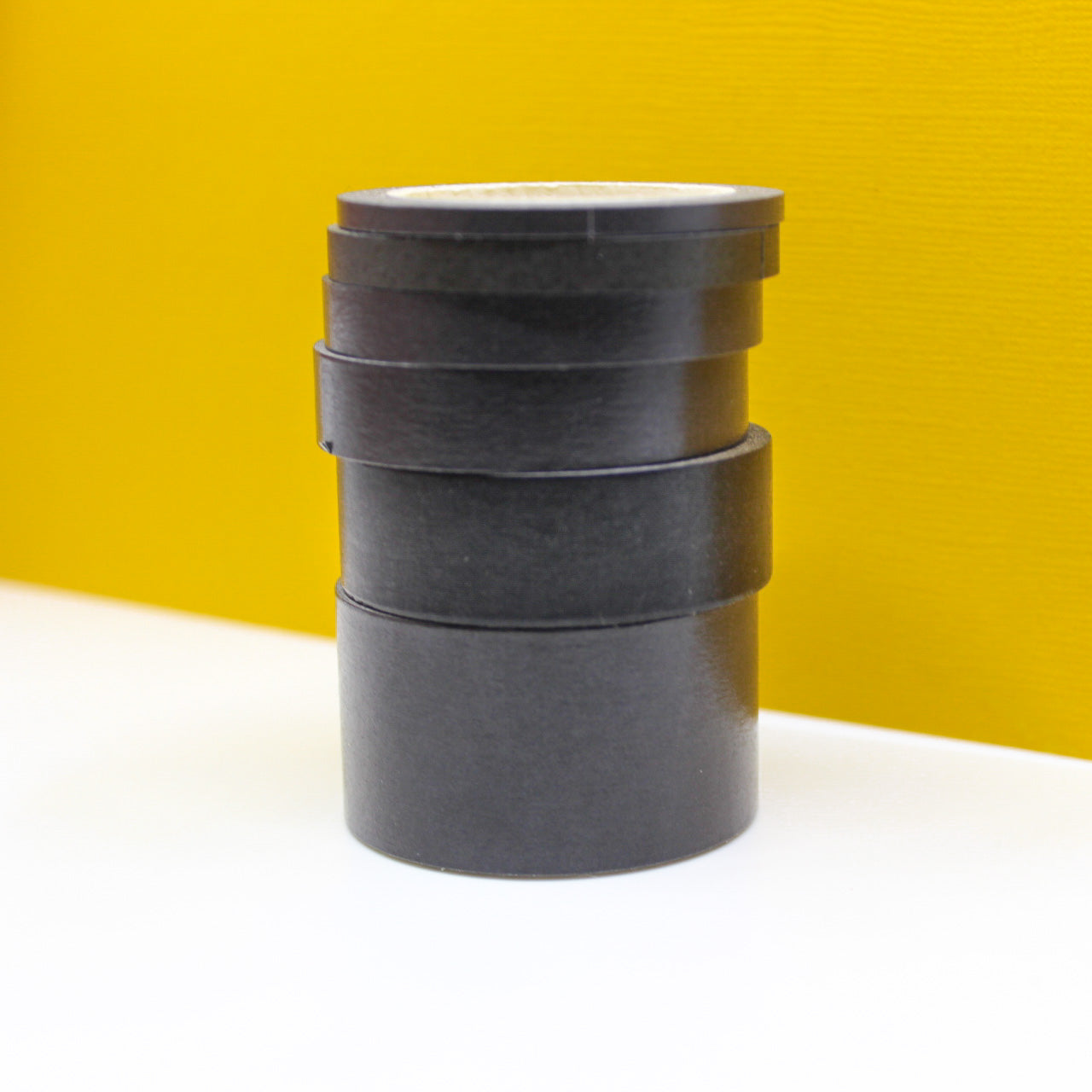 Enhance your crafts with our solid black washi tape, featuring a sleek and versatile design in a classic black hue, perfect for adding depth and contrast to your projects. This tape is sold exclusively at BBB Supplies Craft Shop.