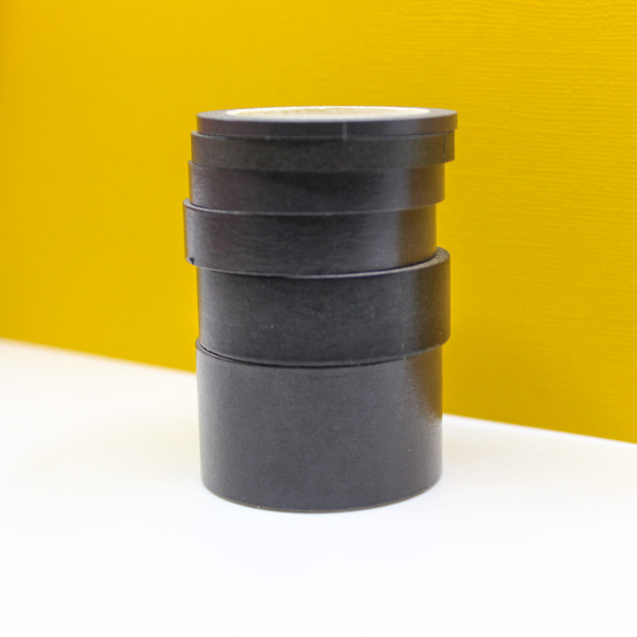 Enhance your crafts with our solid black washi tape, featuring a sleek and versatile design in a classic black hue, perfect for adding depth and contrast to your projects. This tape is sold at BBB Supplies Craft Shop.