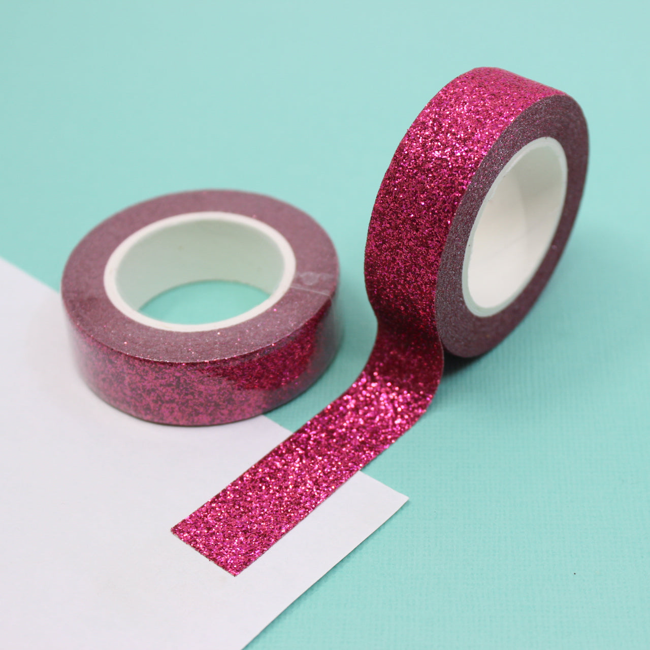 Capture the spirit of love with our Valentine's glitter washi tape, featuring sparkling hearts and romantic motifs in shades of red and pink, perfect for adding a touch of heartfelt sparkle to your crafts. This tape is sold at BBB Supplies Craft Shop.