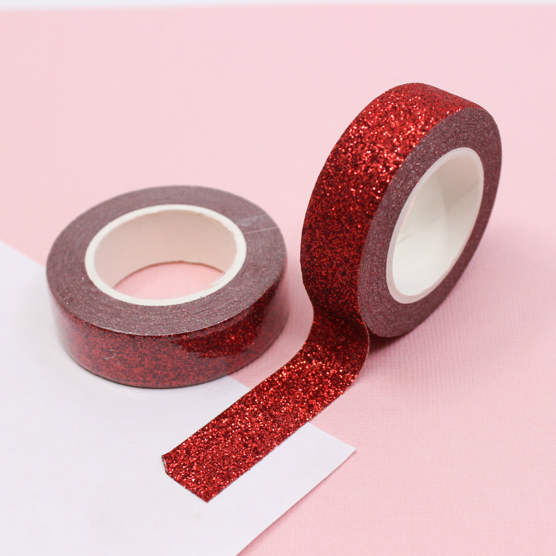 Capture the spirit of love with our Valentine's glitter washi tape, featuring sparkling hearts and romantic motifs in shades of red and pink, perfect for adding a touch of heartfelt sparkle to your crafts. This tape is sold at BBB Supplies Craft Shop.