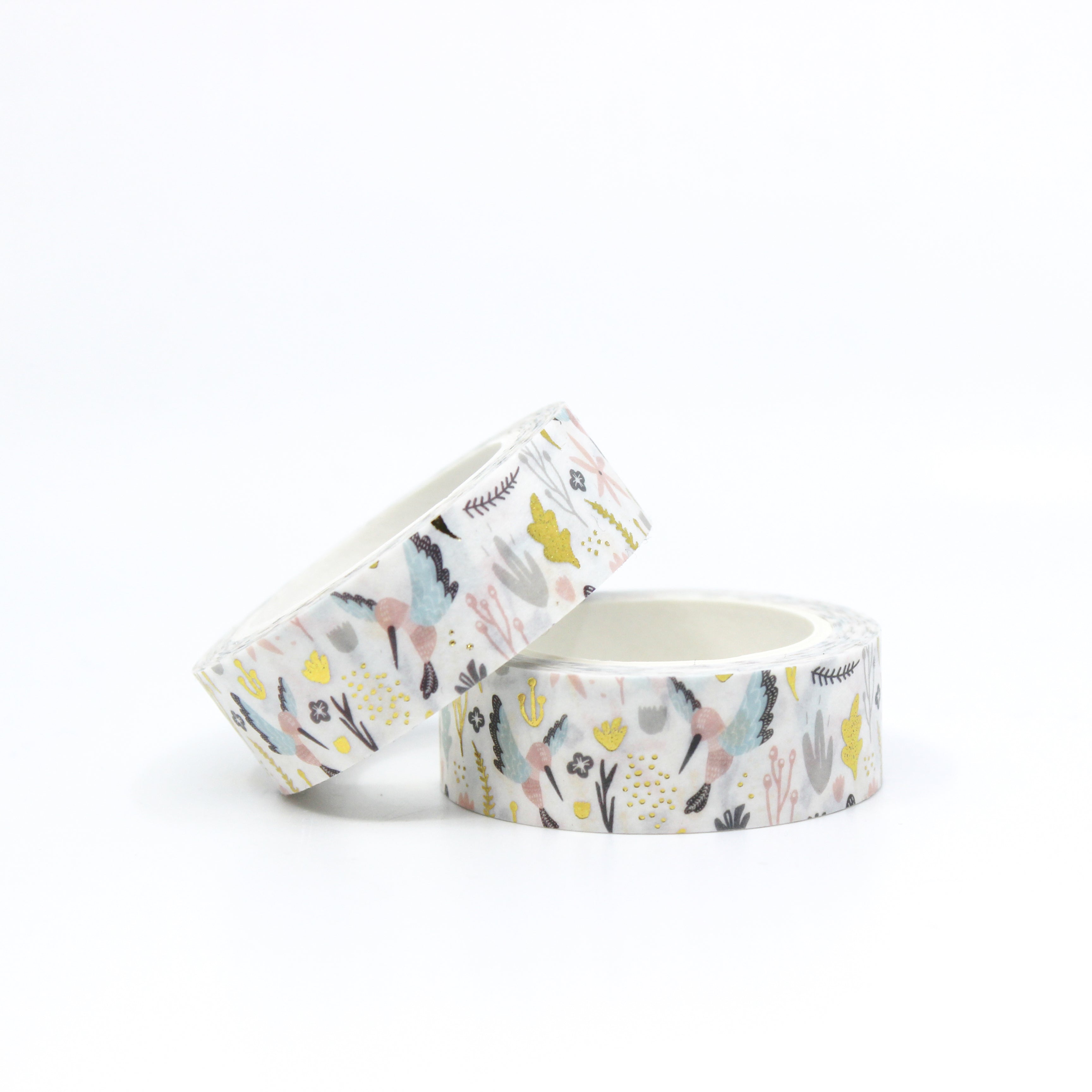 Embark on a whimsical journey with our fairytale hummingbird washi tape, featuring delicate hummingbirds amidst an enchanted backdrop of flowers and magical elements. This tape is sold at BBB Supplies Craft Shop.