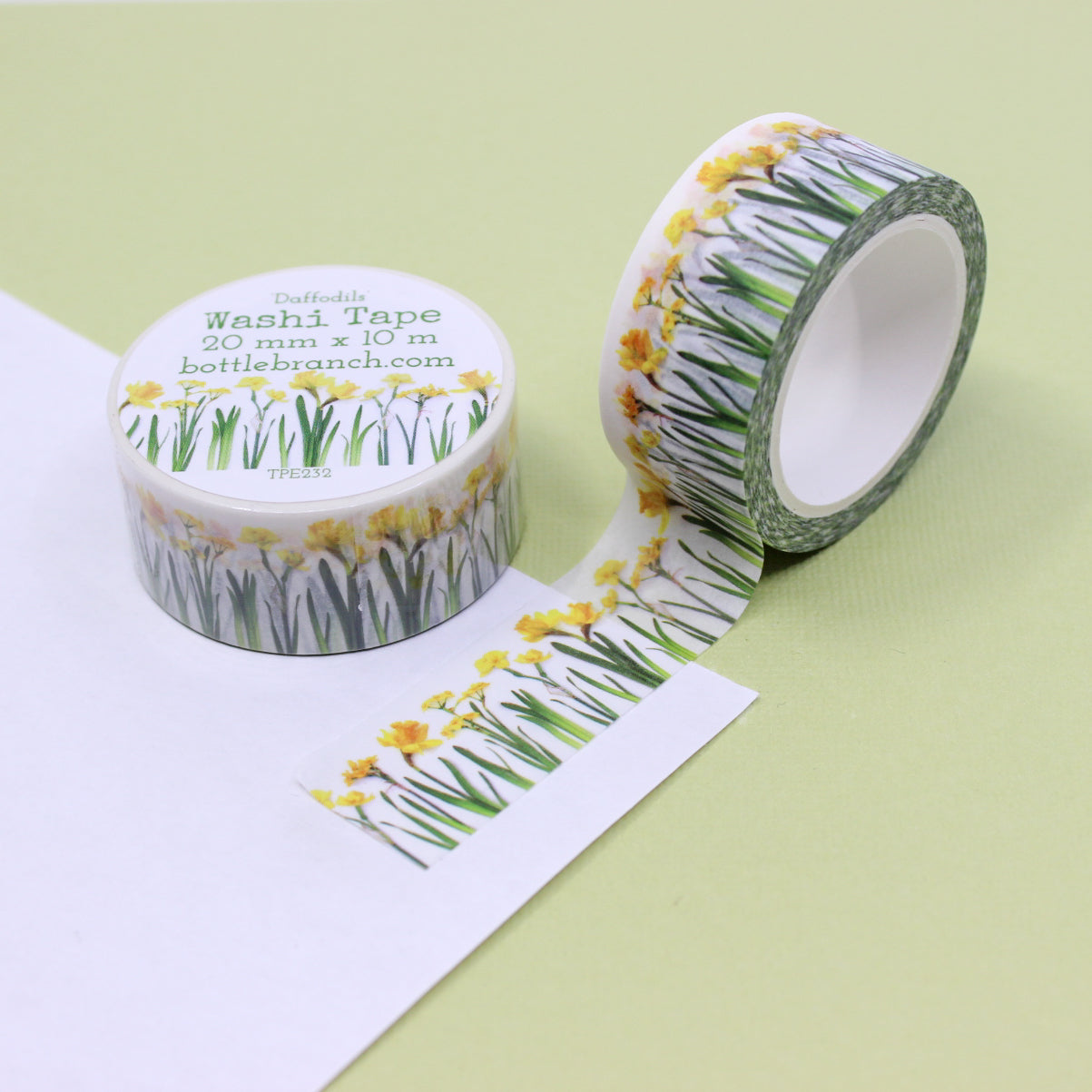 Add a touch of sunshine to your projects with our vibrant yellow daffodil washi tape, featuring cheerful daffodil blooms in shades of yellow. our delightful yellow daffodil washi tape, adorned with beautiful daffodil flower patterns that radiate warmth and joy. This tape is designed by Bottle Branch and sold at BBB Supplies Craft Shop.