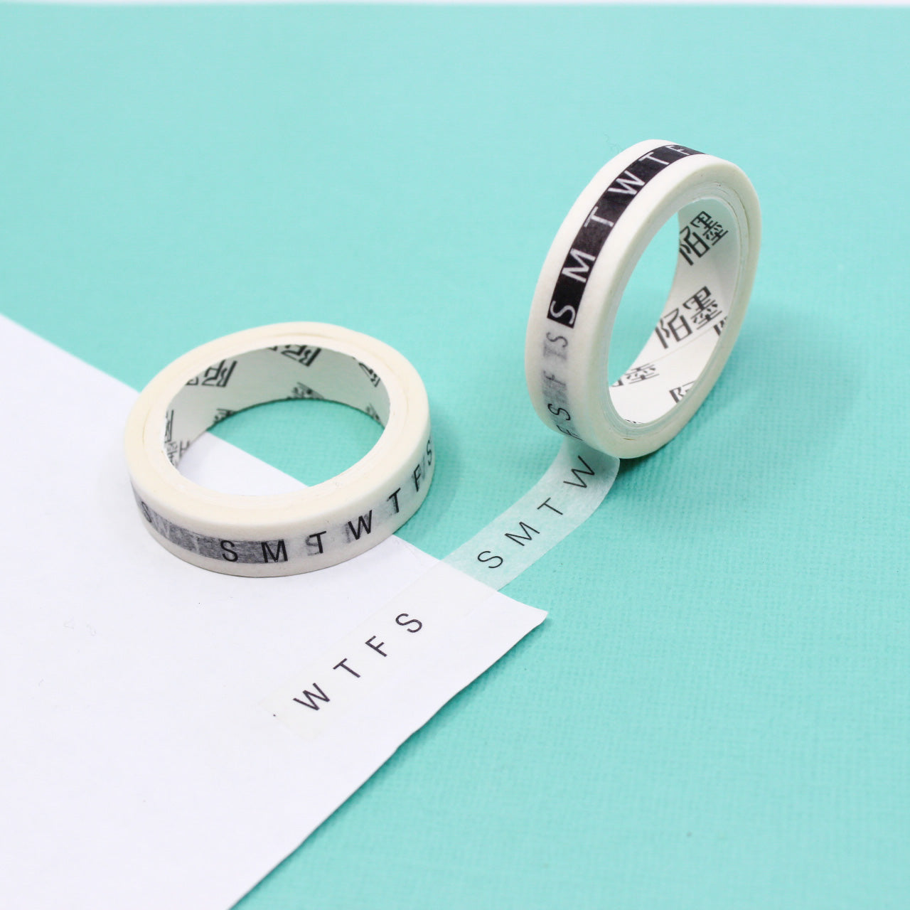 Stay organized with our Abbreviated Black and White Days of the Week Planner Washi Tape, featuring clear and concise day abbreviations. Ideal for adding a sleek and functional touch to your planner or calendar. This tape is sold at BBB Supplies Craft Shop.