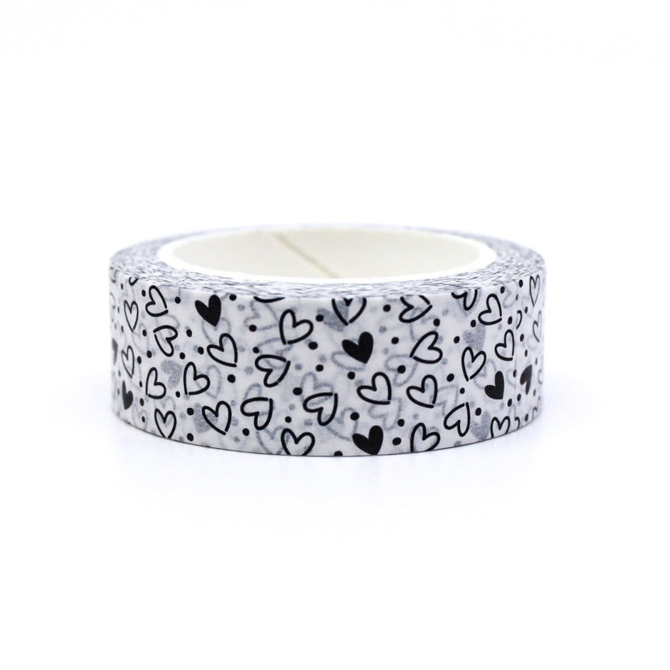 Add a playful touch to your crafts with this fun and modern black and white hearts washi tape. Featuring a stylish heart pattern, this tape is perfect for adding a pop of pattern to your projects. Use it to decorate scrapbook pages, greeting cards, and more! This tape is sold at BBB Supplies Craft Shop.