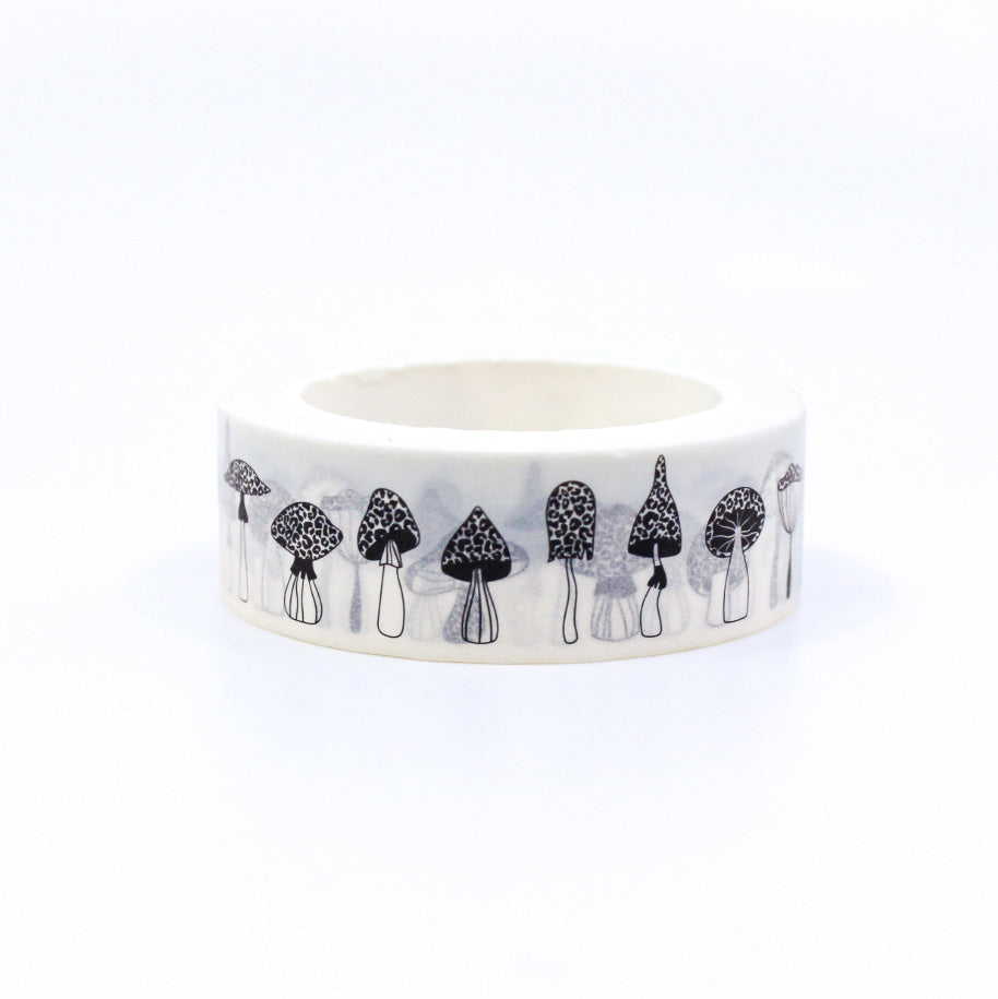 Black and White Mushrooms Washi Tape, featuring an intricate monochrome mushroom pattern, an elegant addition to your stationery. This tape is sold at BBB Supplies Craft Shop.