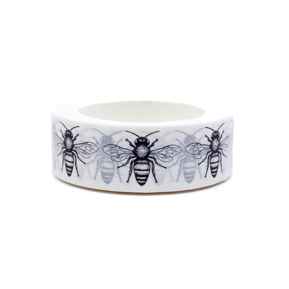 Add a touch of nature to your crafts with this charming washi tape featuring black and white bees. Perfect for nature lovers, gardeners, or anyone who enjoys a whimsical touch, this tape is ideal for scrapbooking, card-making, journaling, and more. This tape is sold at BBB Supplies Craft Shop.