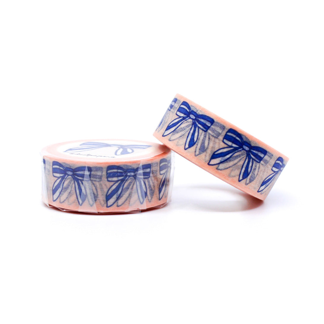 "Blue Bows & Ribbons Washi Tape" features a charming design of blue bows and ribbons, adding a touch of elegance and whimsy to your crafts, journals, and gift wrapping.