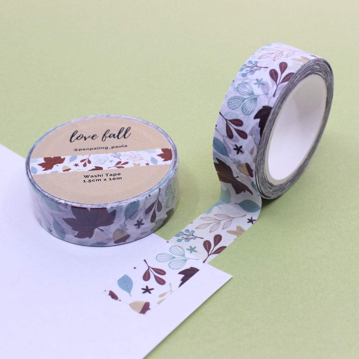 Blue and brown autumn leaves washi tape featuring a delicate pattern of leaves in seasonal tones. Perfect for scrapbooking, journaling, and crafting projects