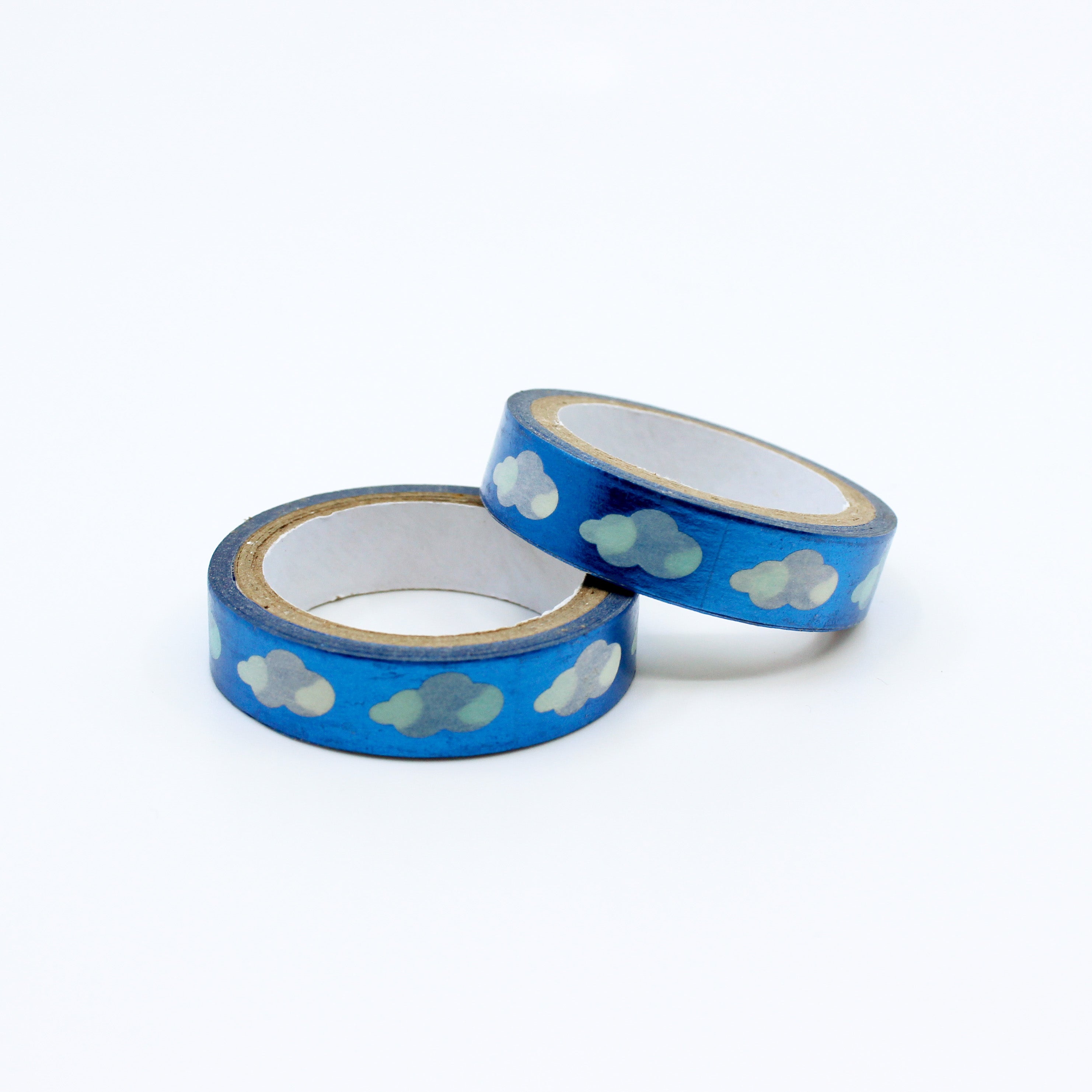 Blue washi tape with shimmering foil clouds, ideal for decorating planners, scrapbooks, and craft projects.