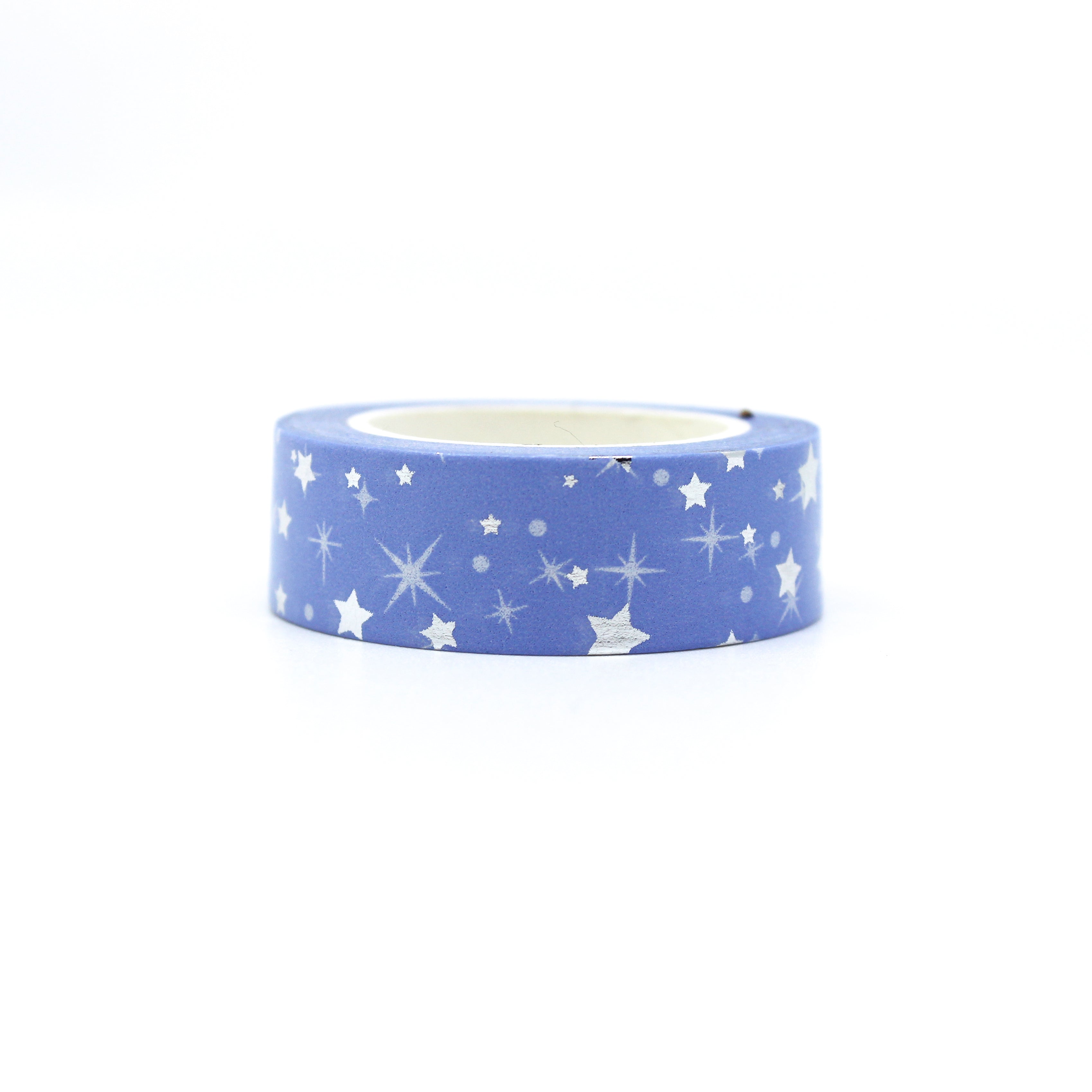 Elevate your crafts with our Blue Silver Foil Stars Washi Tape, featuring a celestial design with shimmering silver foil stars against a rich blue background. Ideal for adding a touch of cosmic elegance to your projects. This tape is sold at BBB Supplies Craft Shop.