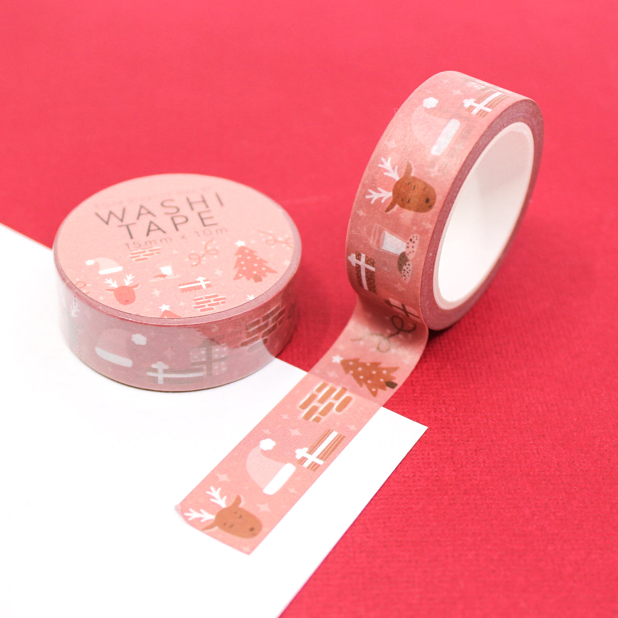 Christmas Chimney Holiday Objects Washi Tape, a delightful tape adorned with festive chimney scenes, stockings, and holiday decorations, adding a cozy and charming touch to your Christmas-themed projects. This tape is from Elyse Breanne Designs and sold at BBB Supplies Craft Shop.