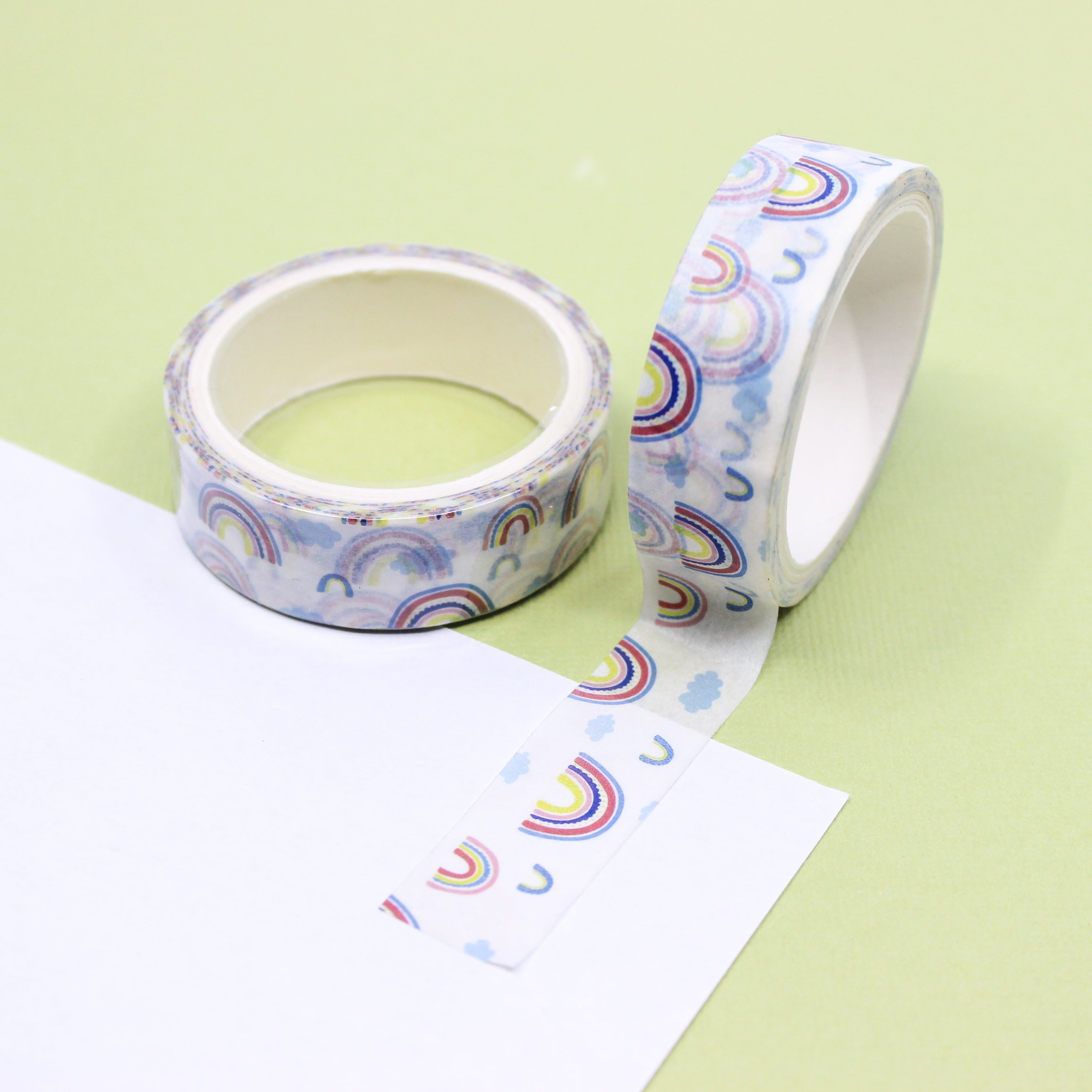 Add a dose of cuteness to your crafts with our Cute Rainbows & Cloud Washi Tape, featuring delightful rainbow and cloud motifs. Perfect for adding a whimsical and cheerful touch to your projects. This tape is sold at BBB Supplies Craft Shop.