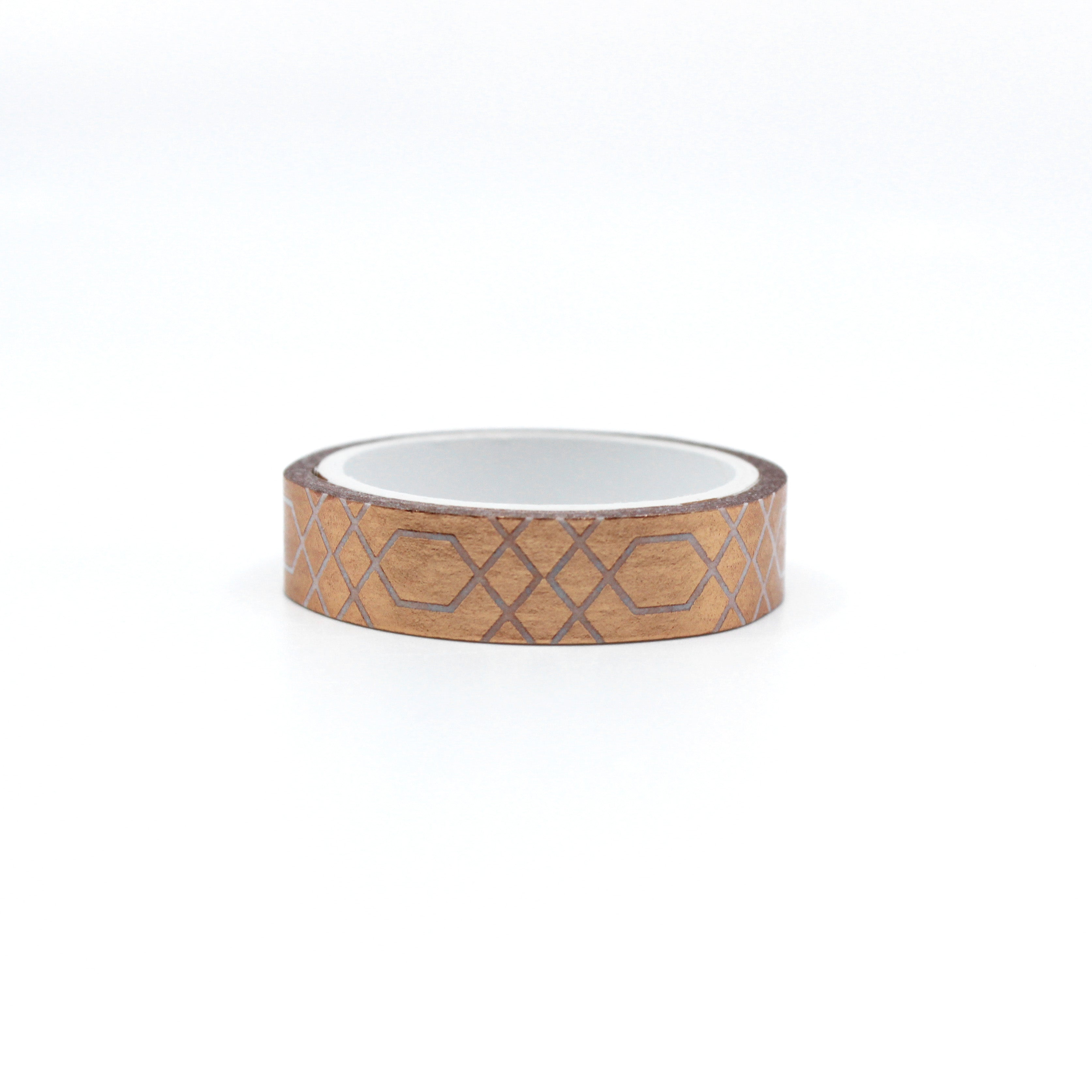 Elevate your crafts with this elegant copper foil washi tape featuring a decorative border scroll design. Perfect for adding a touch of sophistication to your scrapbooking, journaling, or card making projects. This tape is sold at BBB Supplies Craft Shop.