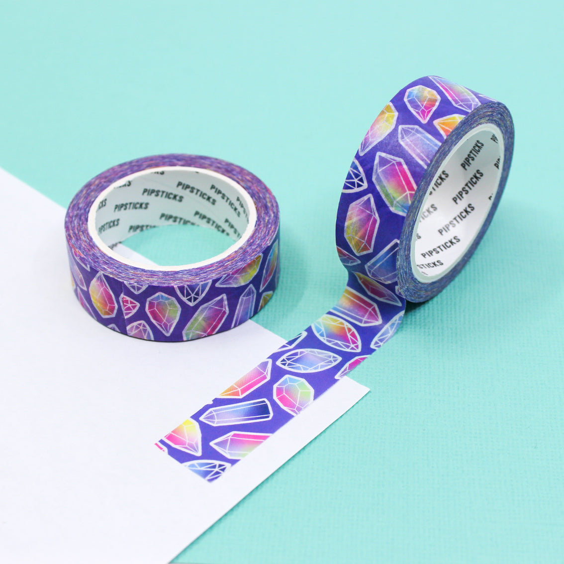 Elevate your crafts with our Colorful Crystal Formations on Purple Washi Tape, featuring vibrant and eye-catching crystal patterns. Ideal for adding a touch of mystique and color to your projects. This tape is from pipsticks and sold at BBB Supplies Craft Shop.