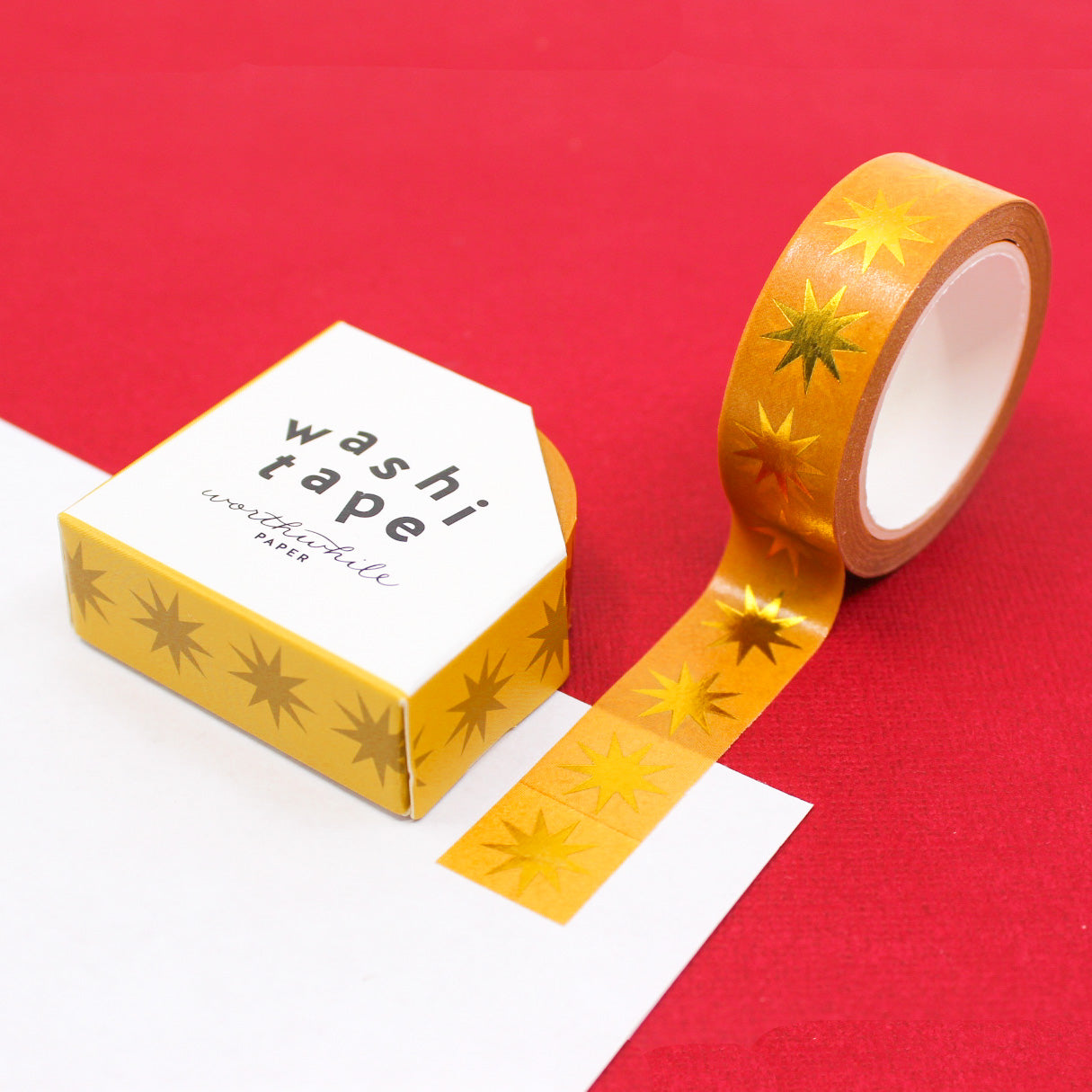 Add a touch of timeless glamour to your projects with our Retro Gold Star Washi Tape. This tape features a classic design of golden stars against a yellow Ochre backdrop. giving your creations a touch of vintage elegance. Perfect for embellishing scrapbooks, planners, or crafting personalized cards, this washi tape brings a nostalgic charm. This tape is from Worthwhile Paper and sold at BBB Supplies Craft Shop.