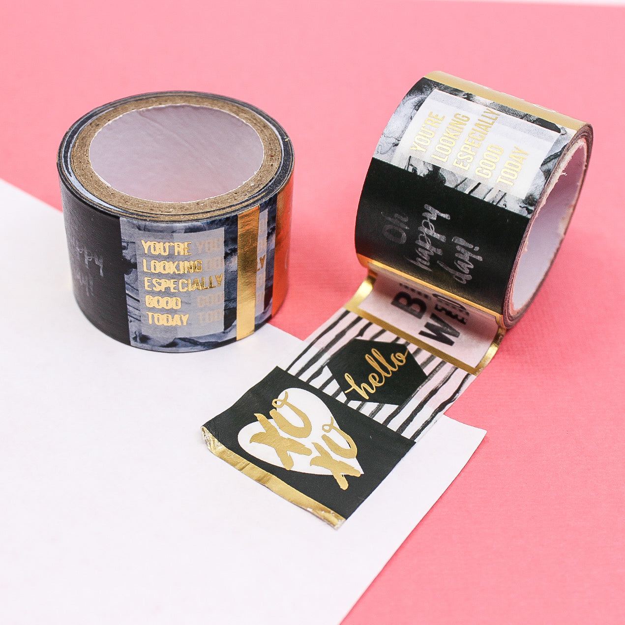 Add a touch of elegance to your projects with this stunning washi tape. Featuring black typography phrases in a variety of styles, accented with gold foil, this tape is perfect for scrapbooking, journaling, card making, and more. This tape is sold at BBB Supplies Craft Shop.