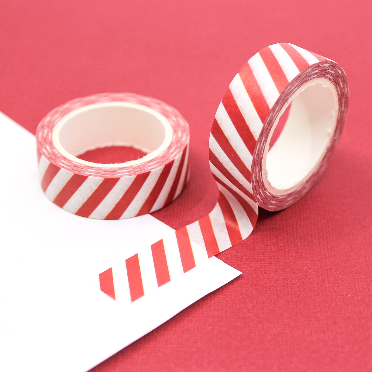 Red Diagonal Stripes Washi Tape with a bold and festive pattern, perfect for holiday crafts, gift wrapping, and planner decoration.