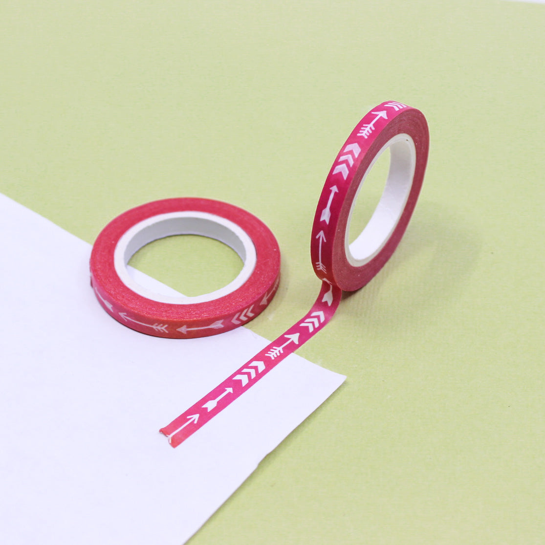 Enhance your crafts with our Narrow Pink Arrow Washi Tape, featuring a sleek and stylish arrow pattern in a vibrant shade of pink. Perfect for adding a contemporary and decorative touch to your projects. This tape is sold at BBB Supplies Craft Shop.
