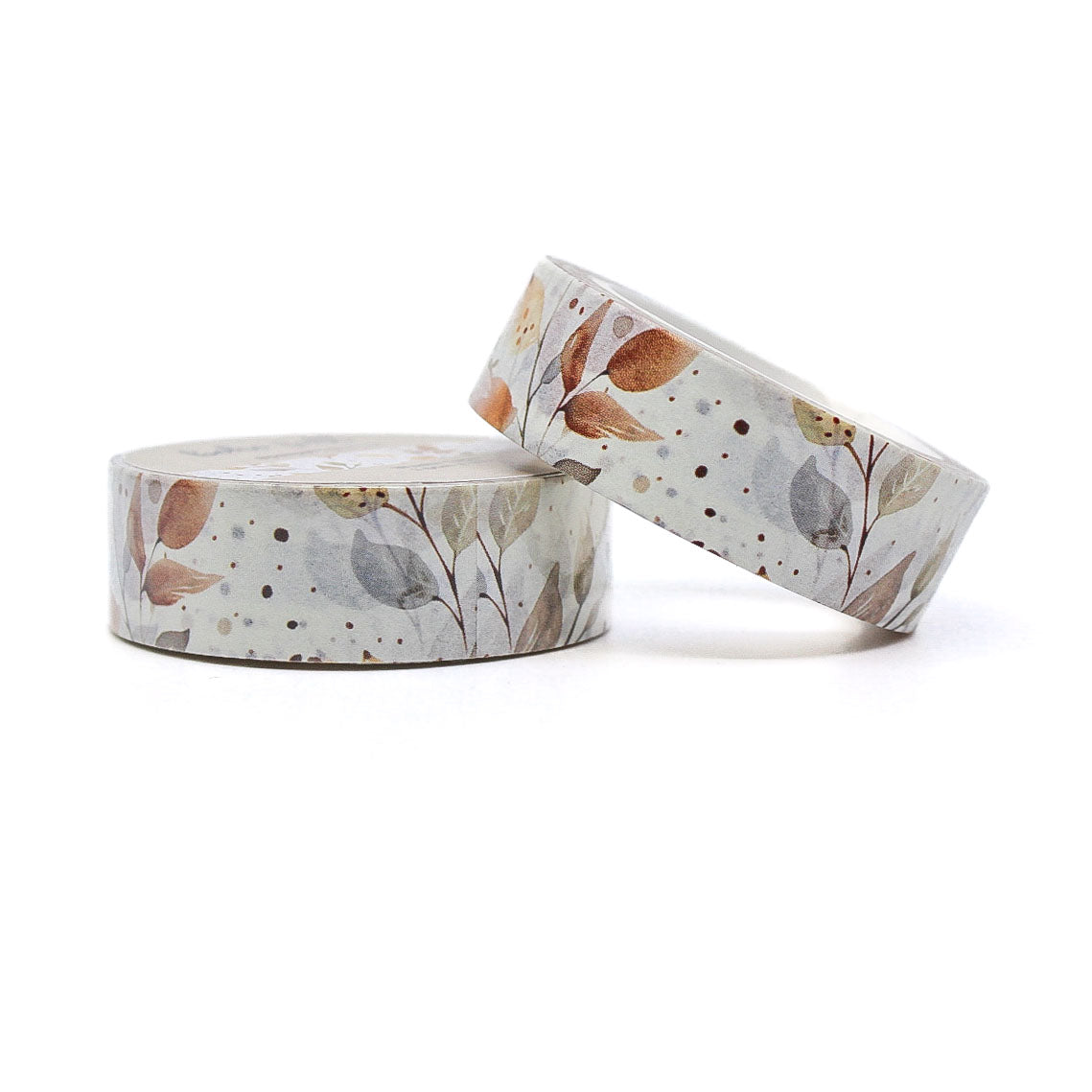 Washi tape with a soft pastel blue and brown autumn leaf branch pattern, featuring a boho-inspired design perfect for fall crafting.