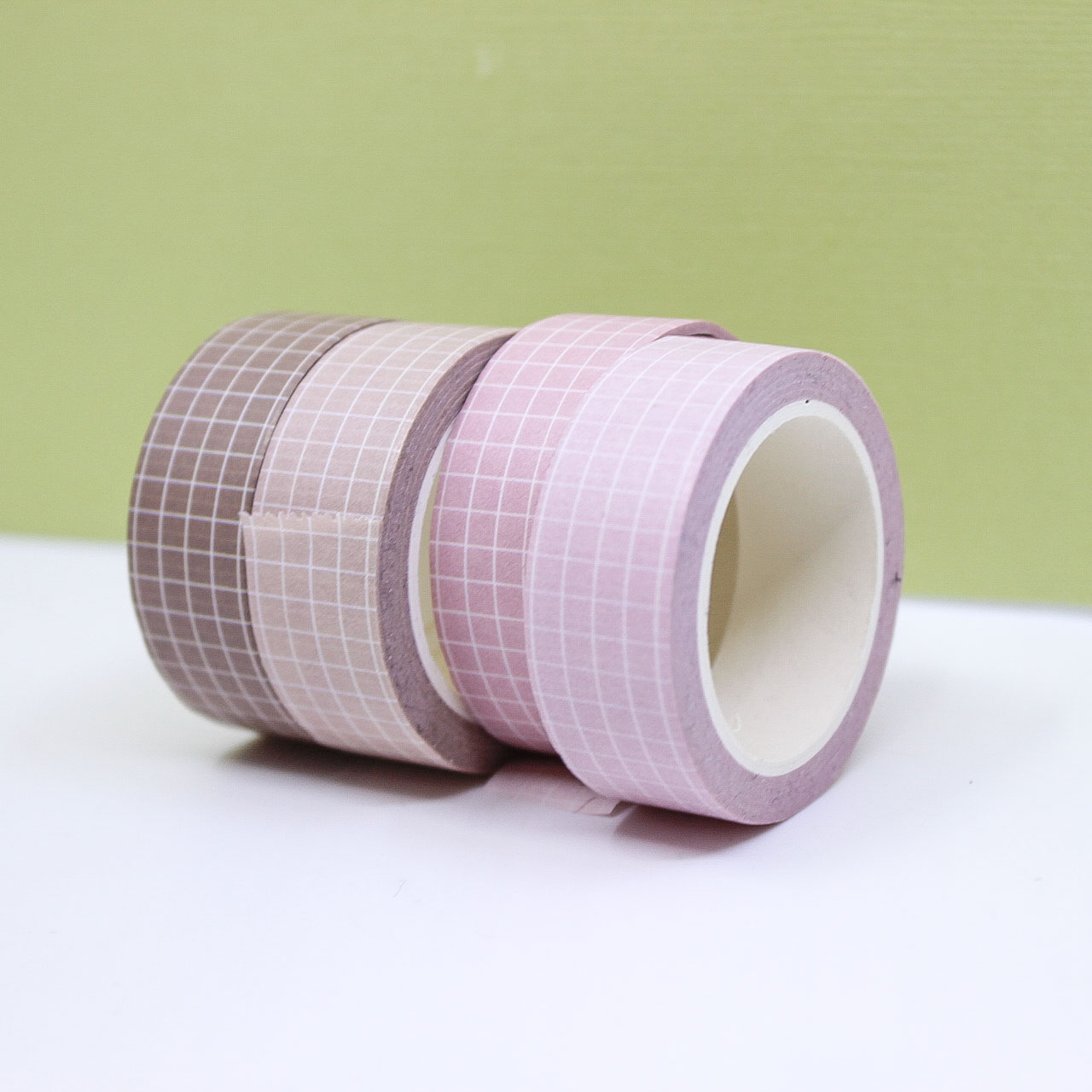 Soft neutrals grid washi tape in shades of soft pink, blush, light tan, and brown, featuring a minimalist grid pattern perfect for elegant and organized crafts.