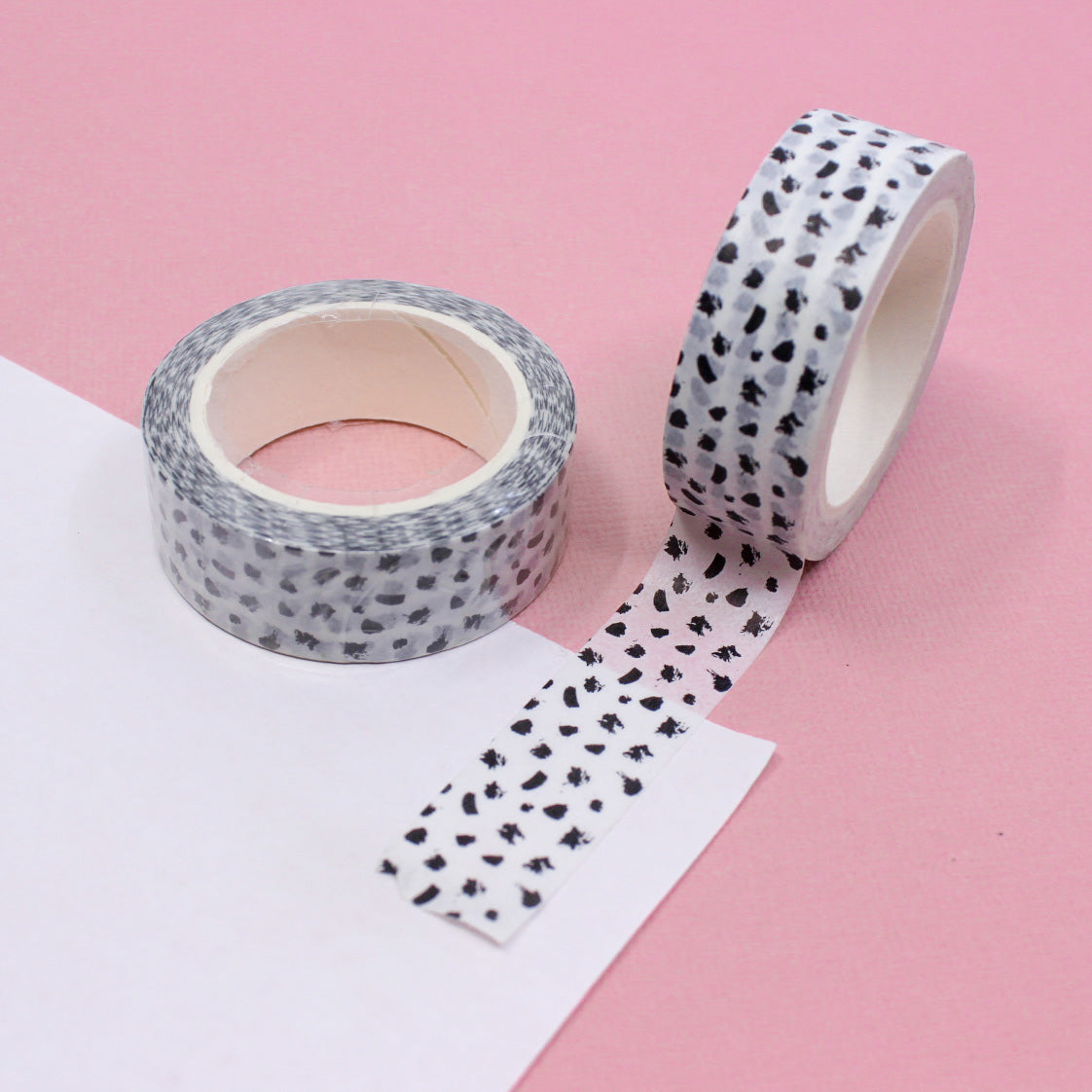 Add a touch of contemporary flair to your projects with this washi tape featuring a modern abstract black and white dots design. Perfect for adding a stylish accent to your crafts. This tape is sold at BBB Supplies Craft Shop.