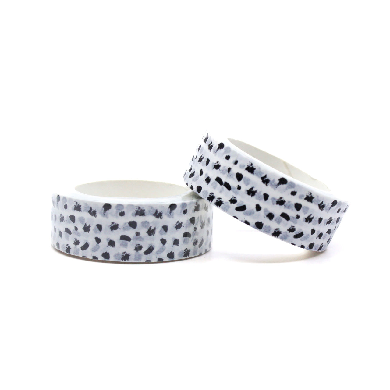 Add a touch of contemporary flair to your projects with this washi tape featuring a modern abstract black and white dots design. Perfect for adding a stylish accent to your crafts. This tape is sold at BBB Supplies Craft Shop.