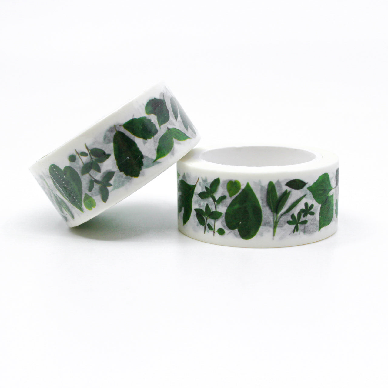 Bring the beauty of nature to your projects with our diverse green leaves and foliage washi tape, showcasing an assortment of lush and vibrant botanical designs. Infuse your projects with the refreshing essence of greenery using our versatile green leaves and foliage washi tape, adorned with an assortment of leaf motifs for a touch of natural beauty. This tape is designed by Bottle Branch and sold at BBB Supplies Craft Shop