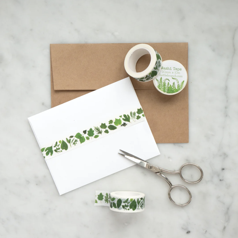 Bring the beauty of nature to your projects with our diverse green leaves and foliage washi tape, showcasing an assortment of lush and vibrant botanical designs. Infuse your projects with the refreshing essence of greenery using our versatile green leaves and foliage washi tape, adorned with an assortment of leaf motifs for a touch of natural beauty. This tape is designed by Bottle Branch and sold at BBB Supplies Craft Shop