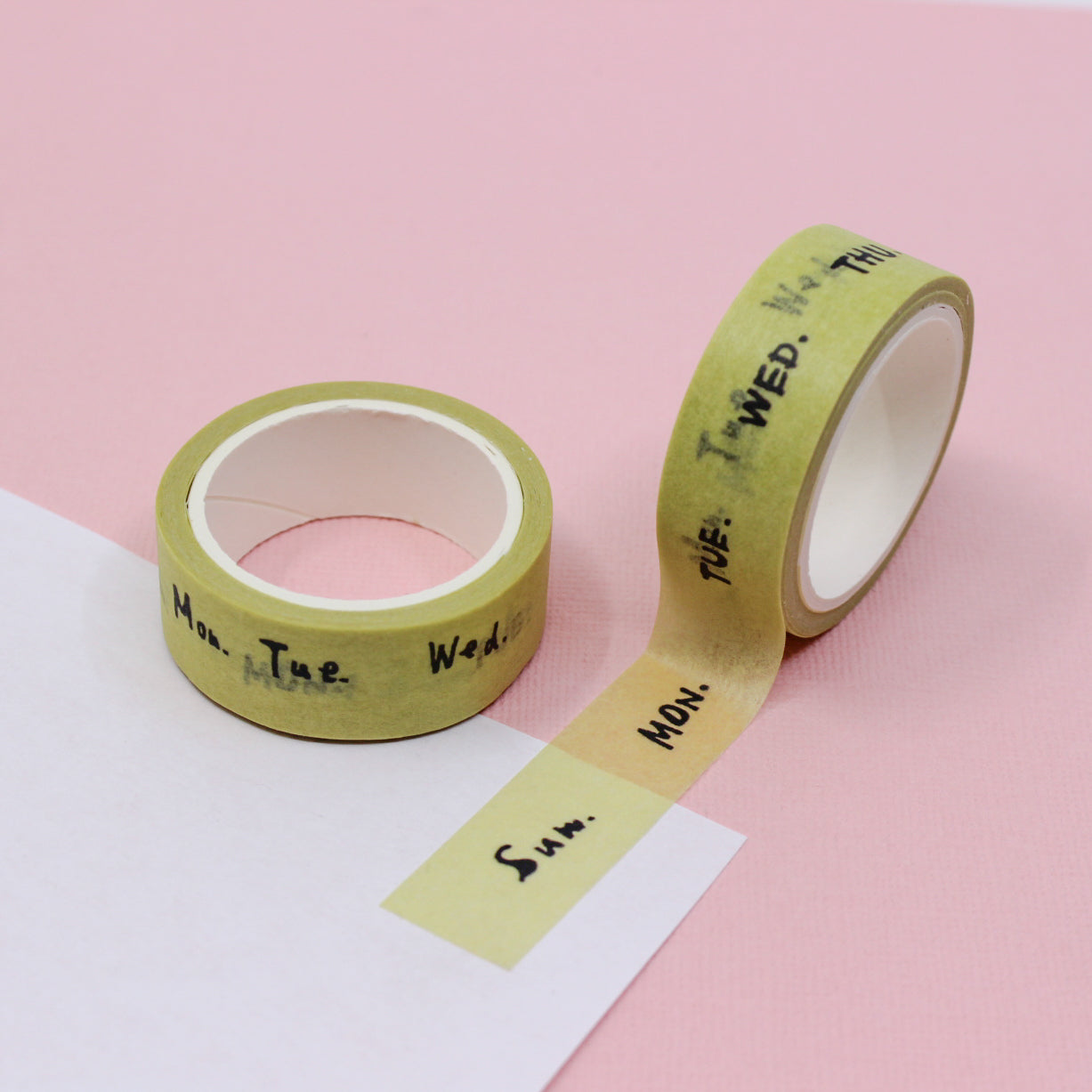 A vibrant Yellow Days of the Week Washi Tape featuring abbreviations for each day of the week. The tape adds a playful and organized touch to scheduling and planning, providing a pop of cheerful color to your planner or calendar. This tape is sold exclusively at BBB Supplies Craft Shop.