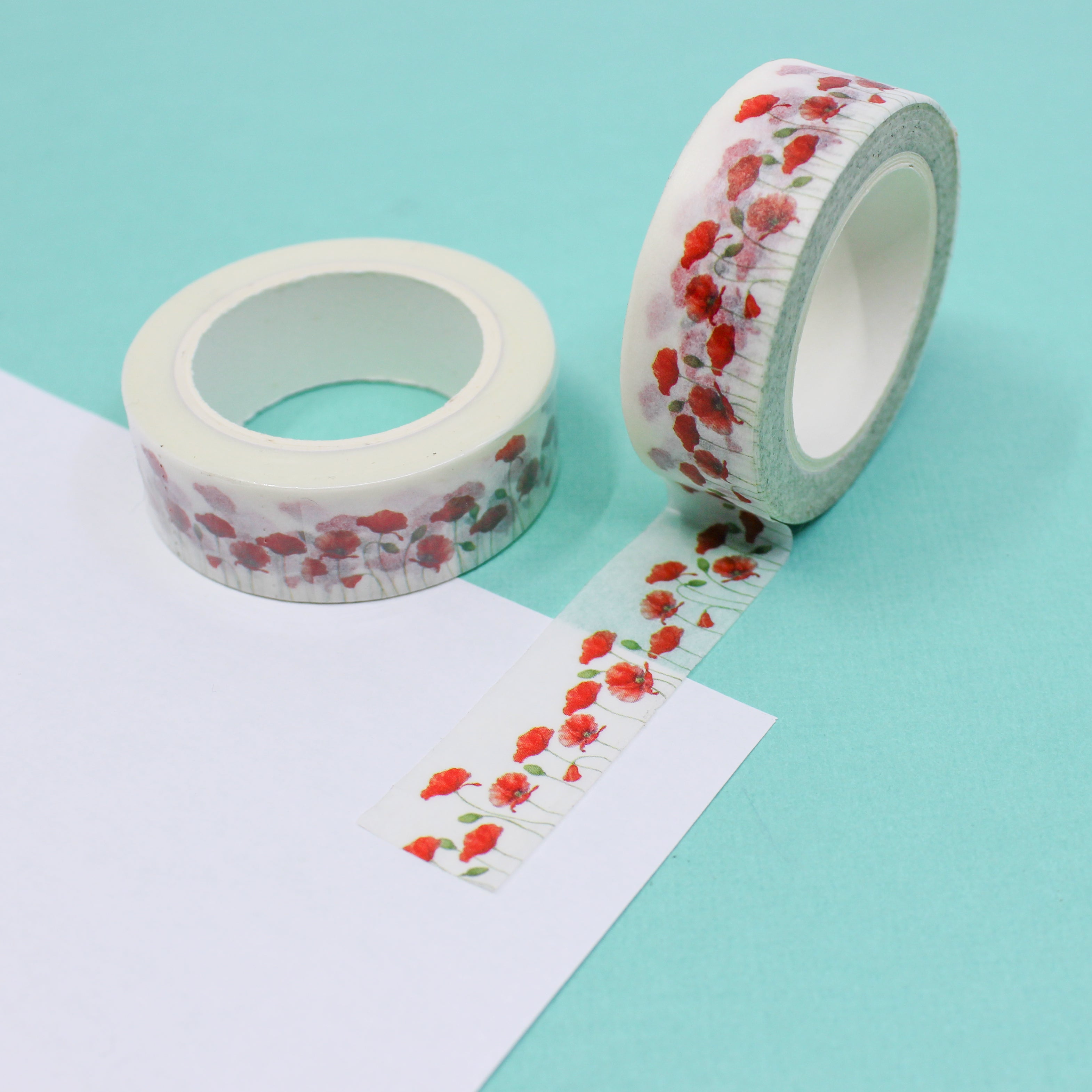 This is a poppy roses flower petals pattern washi tape from BBB Supplies Craft Shop