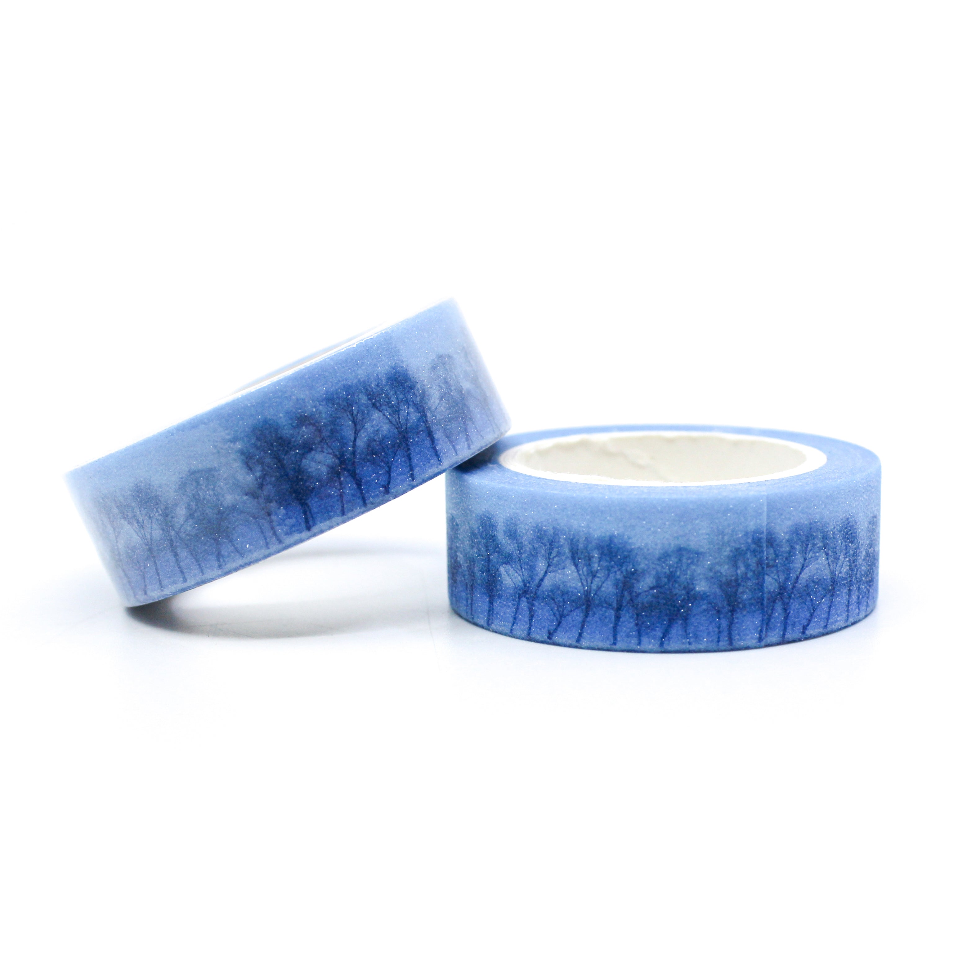 This is a beautiful and moody blue glitter winter Forest Trees landscape washi tape from BBB Supplies.