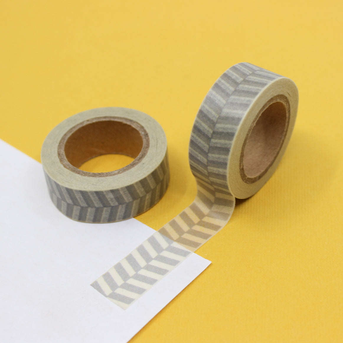 This fun and unique grey chevron color block pattern resemble a zipper. It will make a super cute addition to your washi collection. We sell this style of chevron tape in Yellow, brown and grey in our shop. This tape is sold at BBB Supplies Craft Shop.