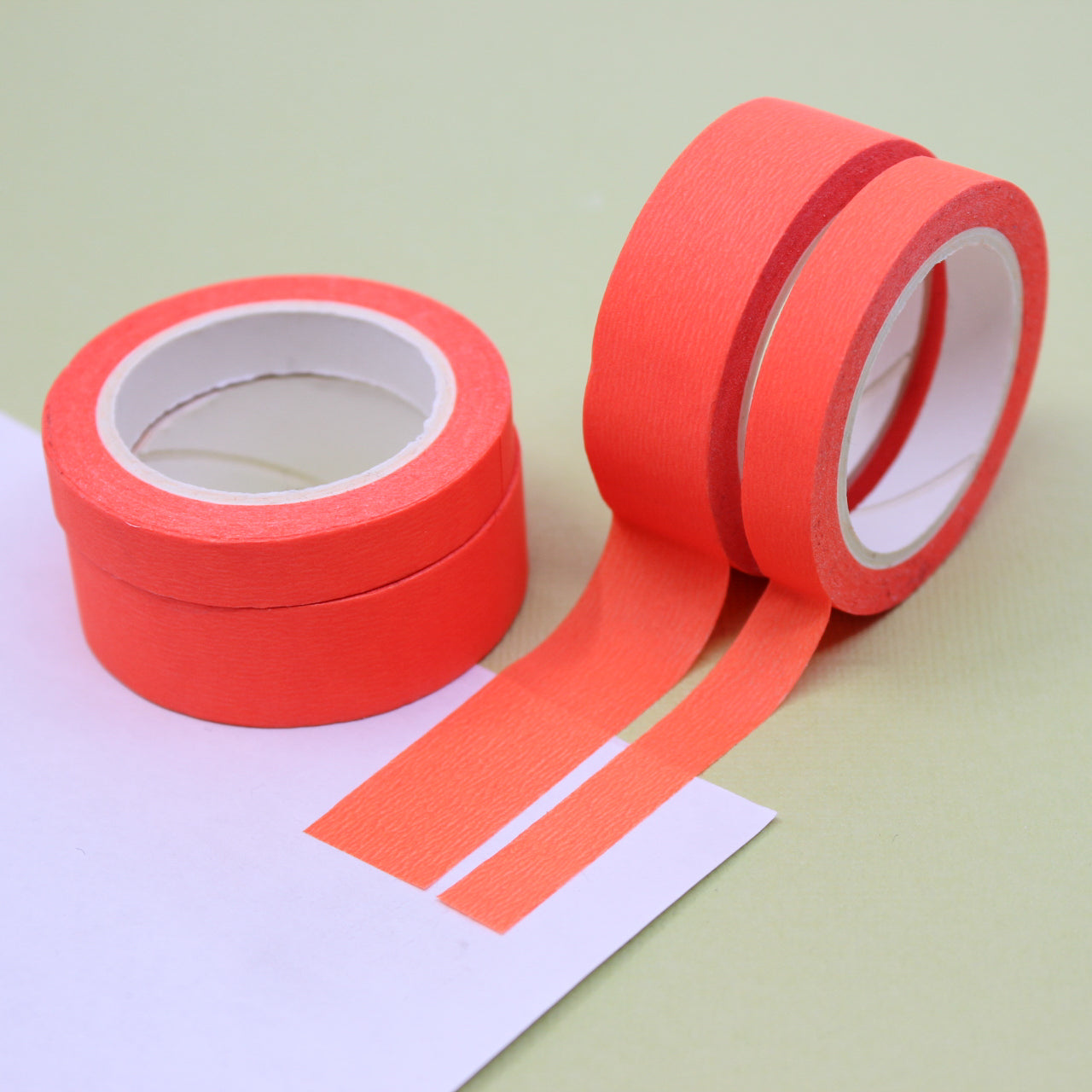 This neon orange washi tape is vibrant and fun. This washi tape is part of our solid neon thick-thin matching duo washi collection. Find the perfect color for any project in BBB Supplies' thick-thin solids collection, from neon to neutral to pastel and more. This tape is sold at BBB Supplies Craft Shop.