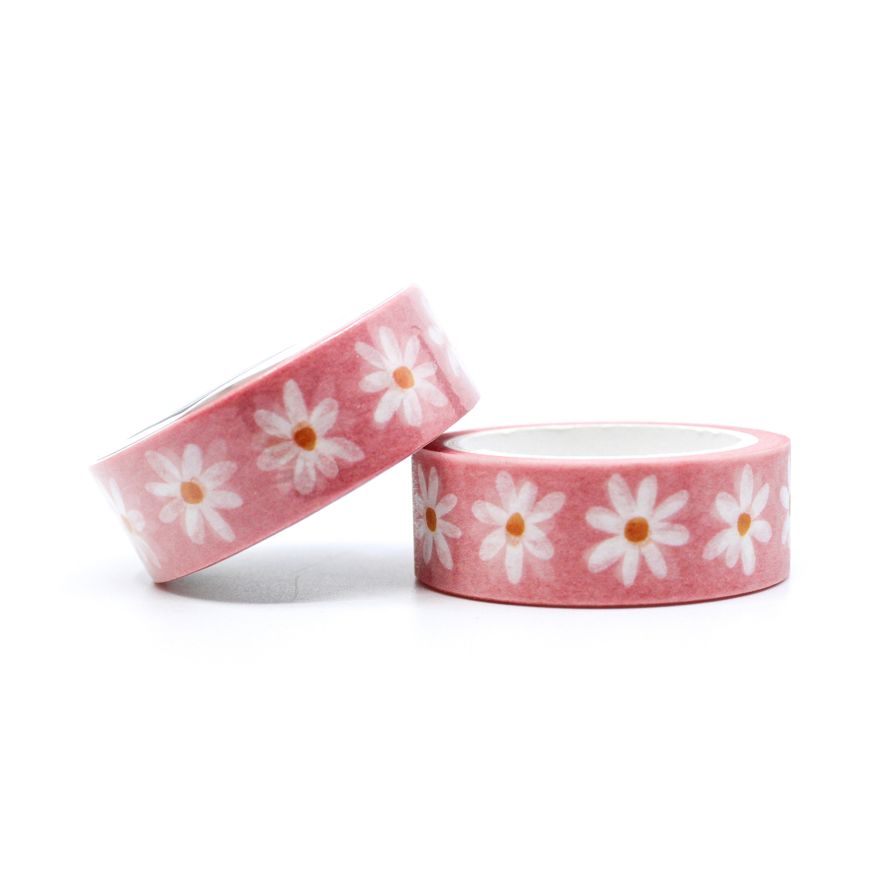 This is a roll of white daisy  with pink background washi tapes from BBB Supplies Craft Shop