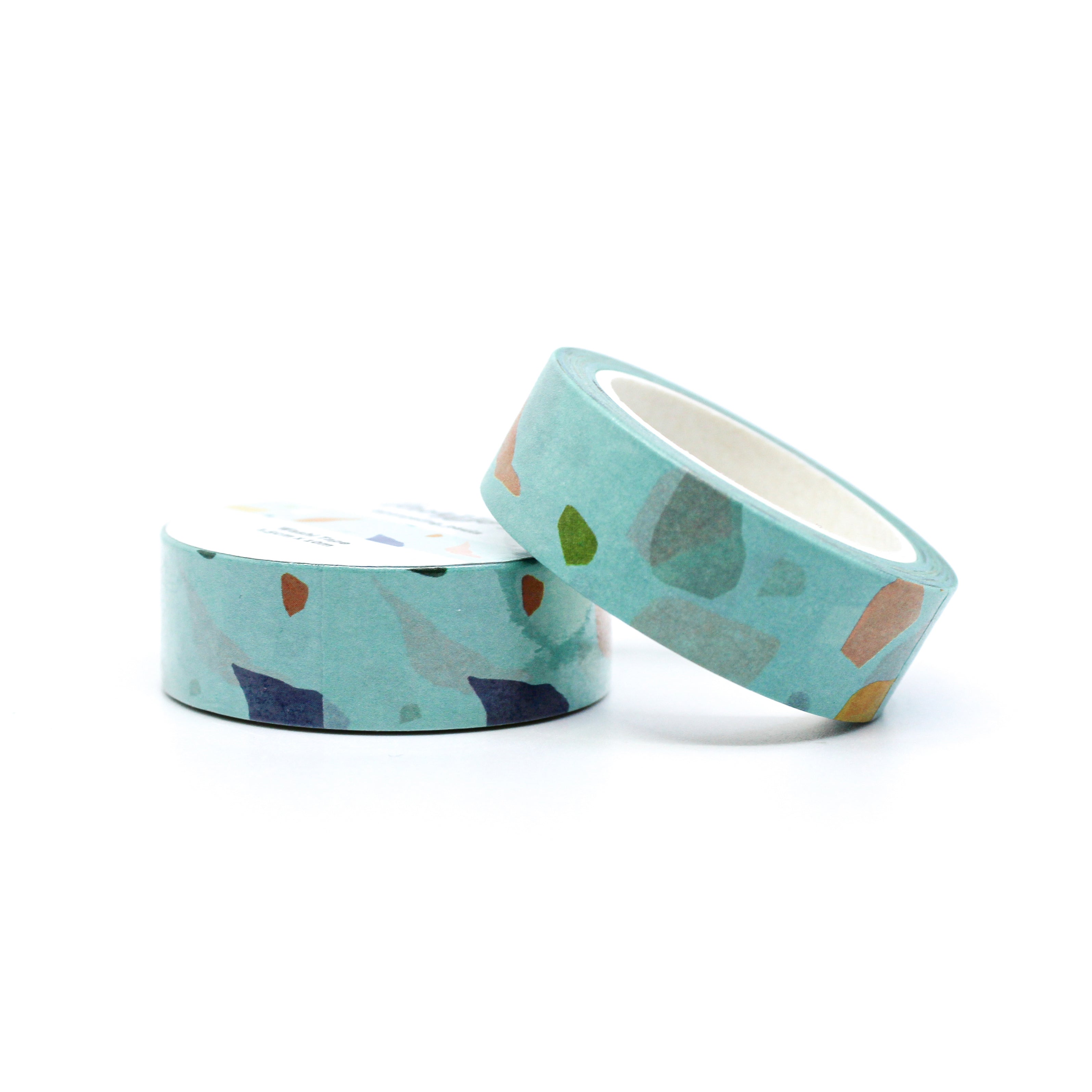 This is a roll of a modern take on blue terrazzo washi tapes from BBB Supplies Craft Shop