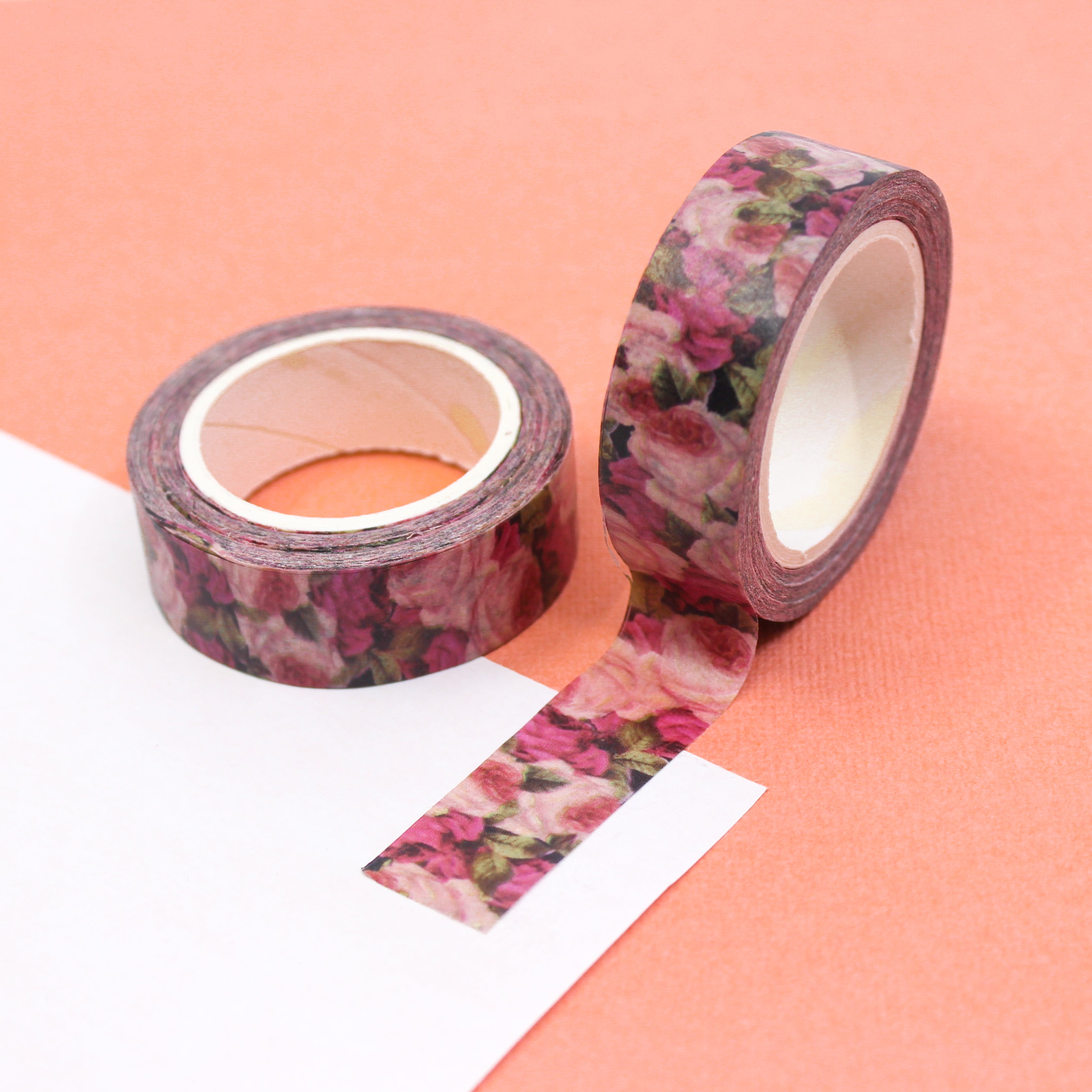 This is a dark and light pink flowers pattern view themed washi tape from BBB Supplies Craft Shop