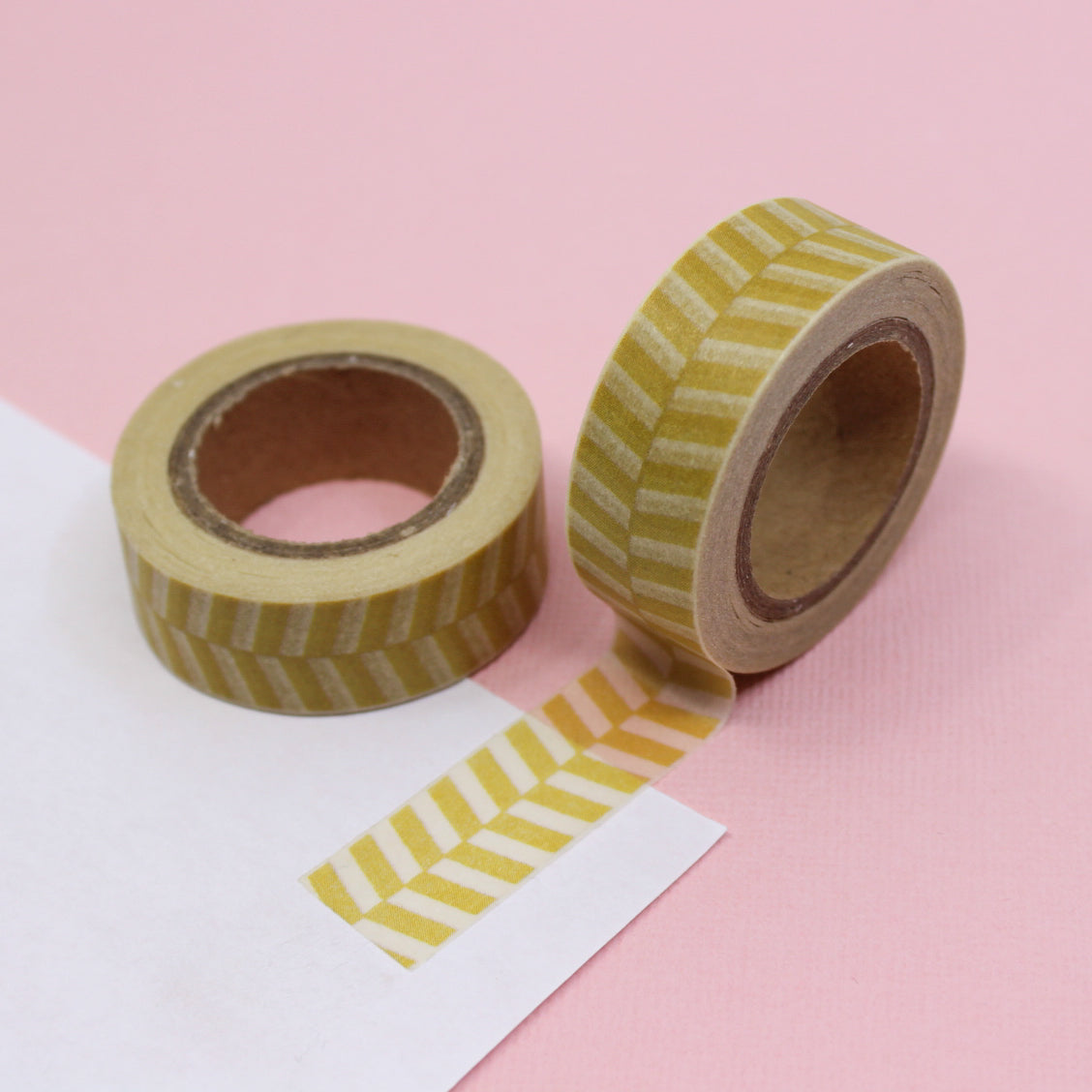 This fun and unique chevron pattern resembles a zipper. It will make a super cute addition to your washi collection. We sell this style of chevron tape in Yellow, brown and grey in our shop. This tape is sold at BBB Supplies Craft Shop.
