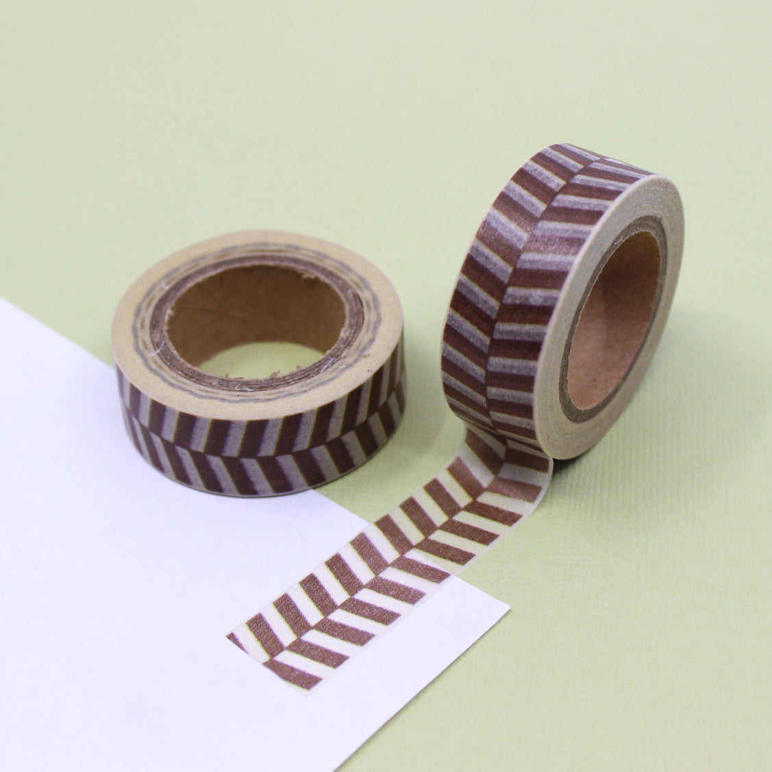 This fun and unique chevron pattern resembles a zipper. It will make a super cute addition to your washi collection. We sell this style of chevron tape in Yellow, brown and grey in our shop. This tape is sold at BBB Supplies Craft Shop. 