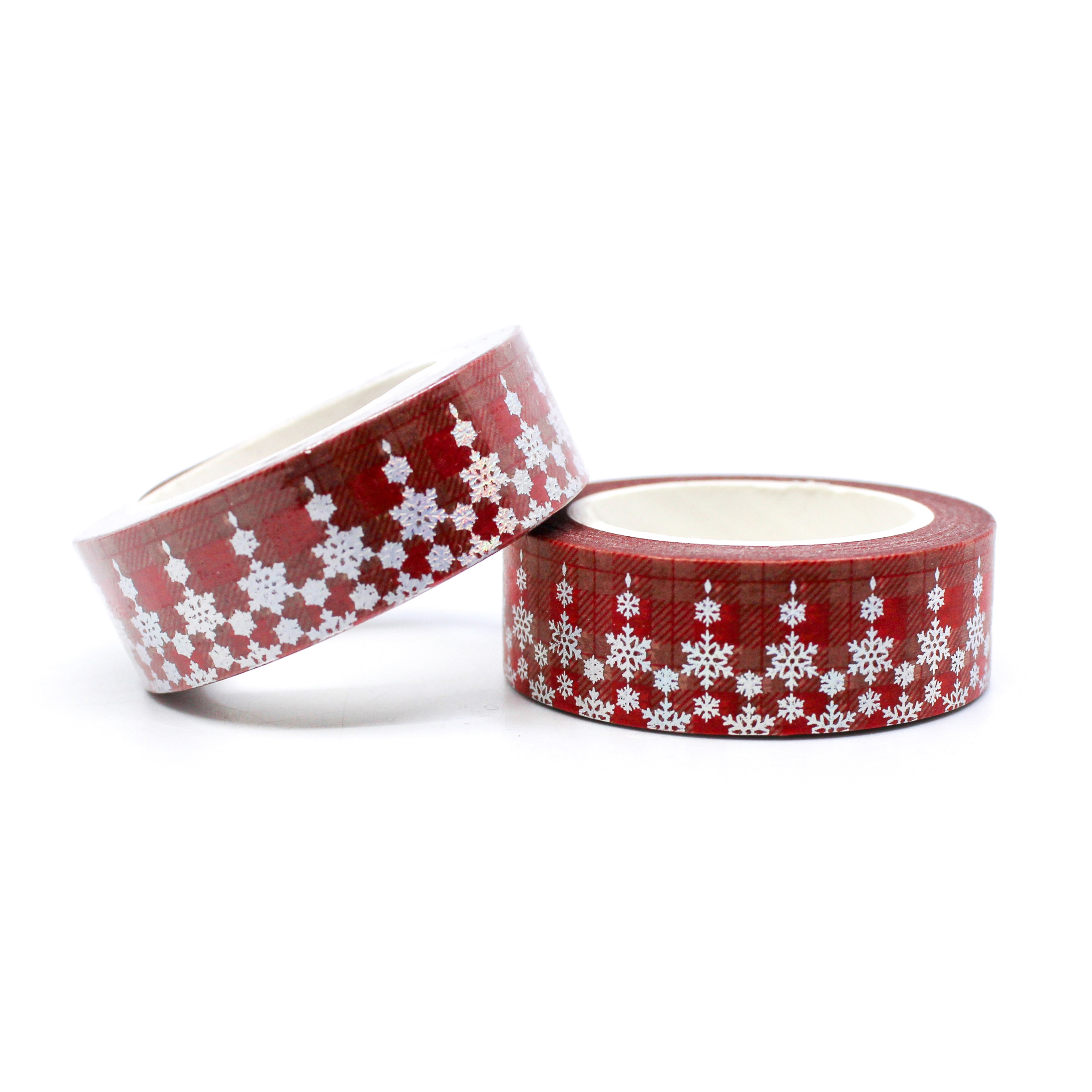 This is a beautiful silver foil snowflake pattern washi tapes on a traditional Holiday red plaid  Background from BBB Supplies Craft Shop