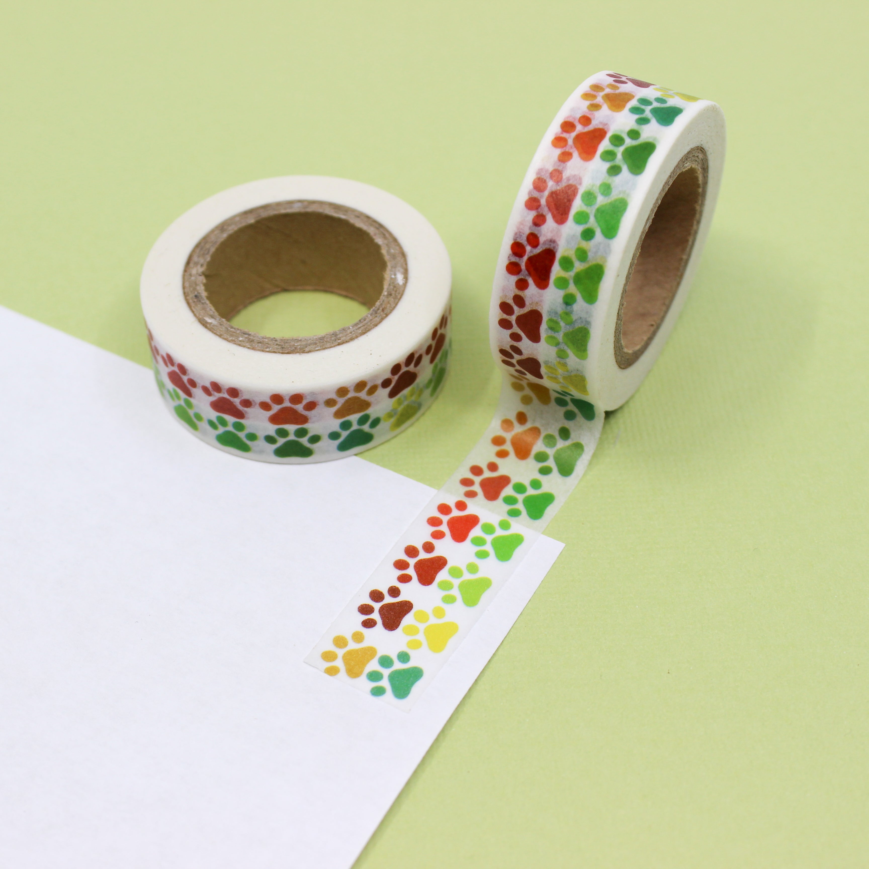 This is a colorful red and green animal paw prints view themed washi tape from BBB Supplies Craft Shop