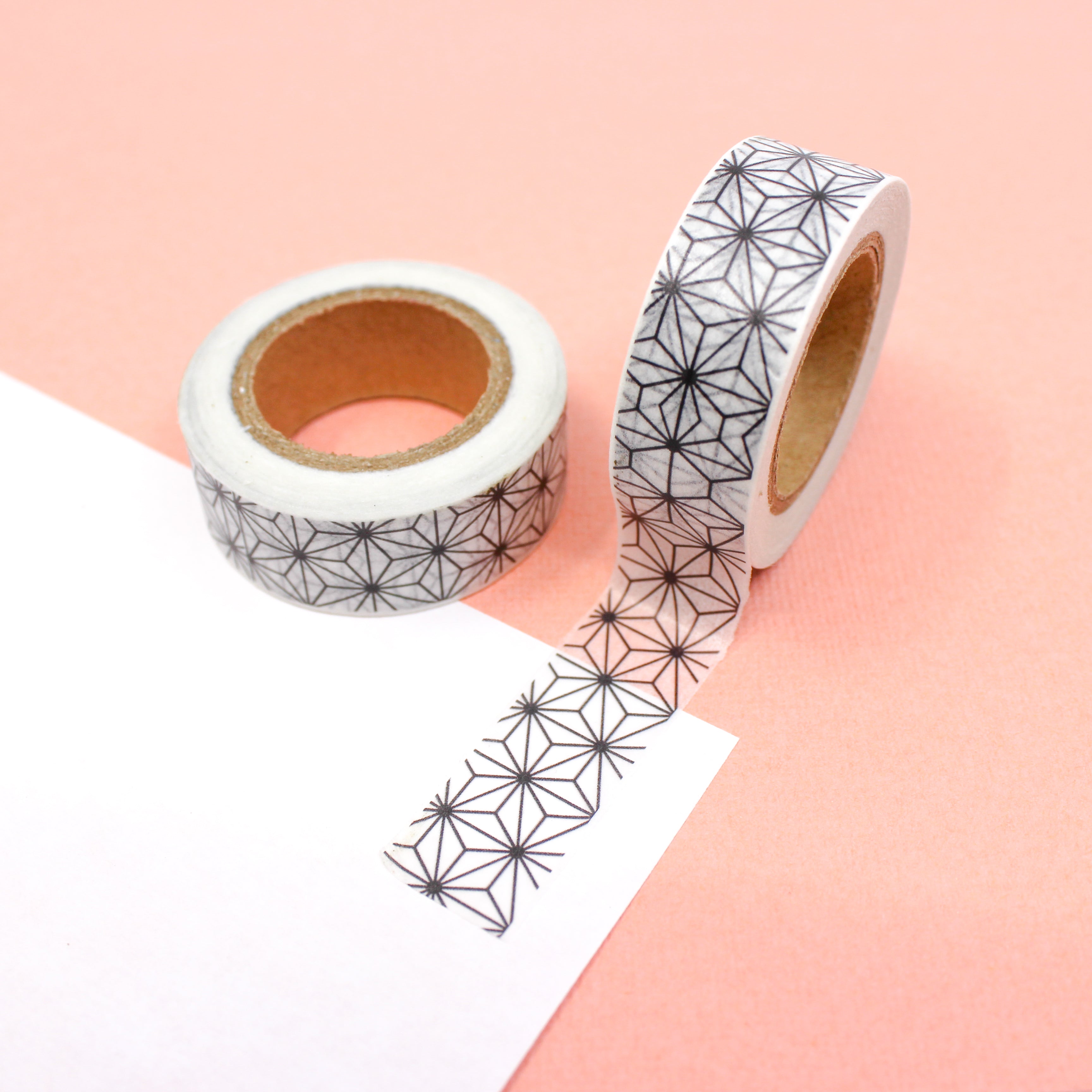 This is a black geometric star flowers pattern washi tape from BBB Supplies Craft Shop